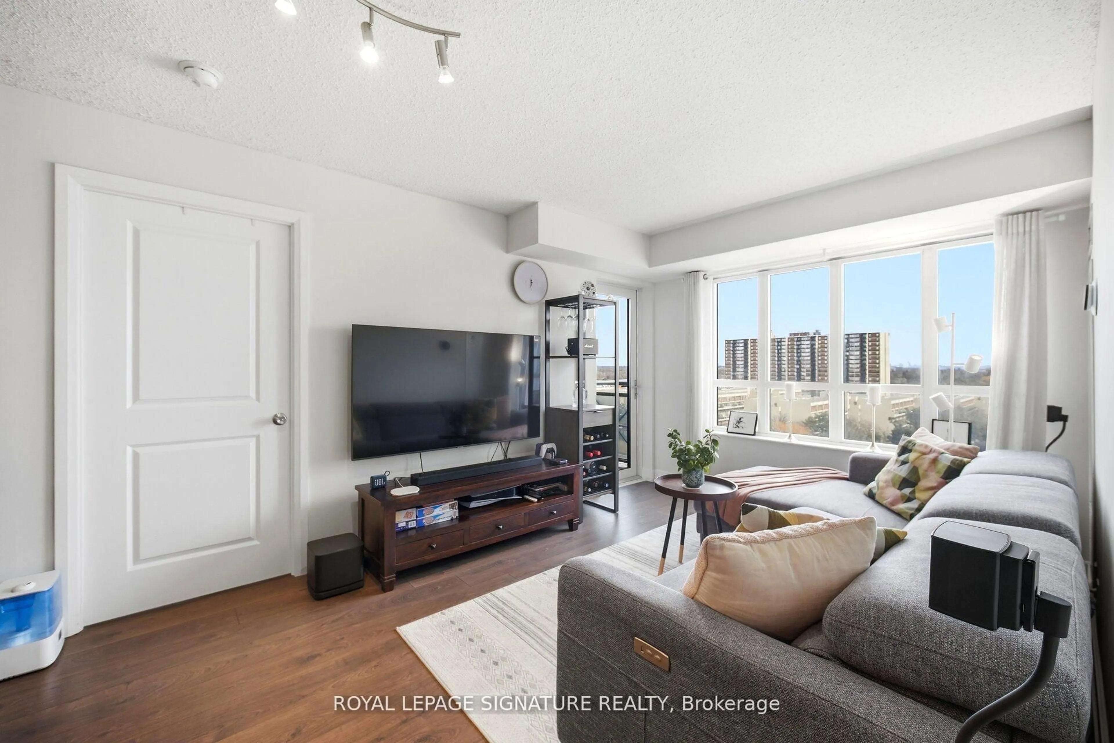 Living room with furniture, unknown for 2 Eva Rd #926, Toronto Ontario M9C 0A9