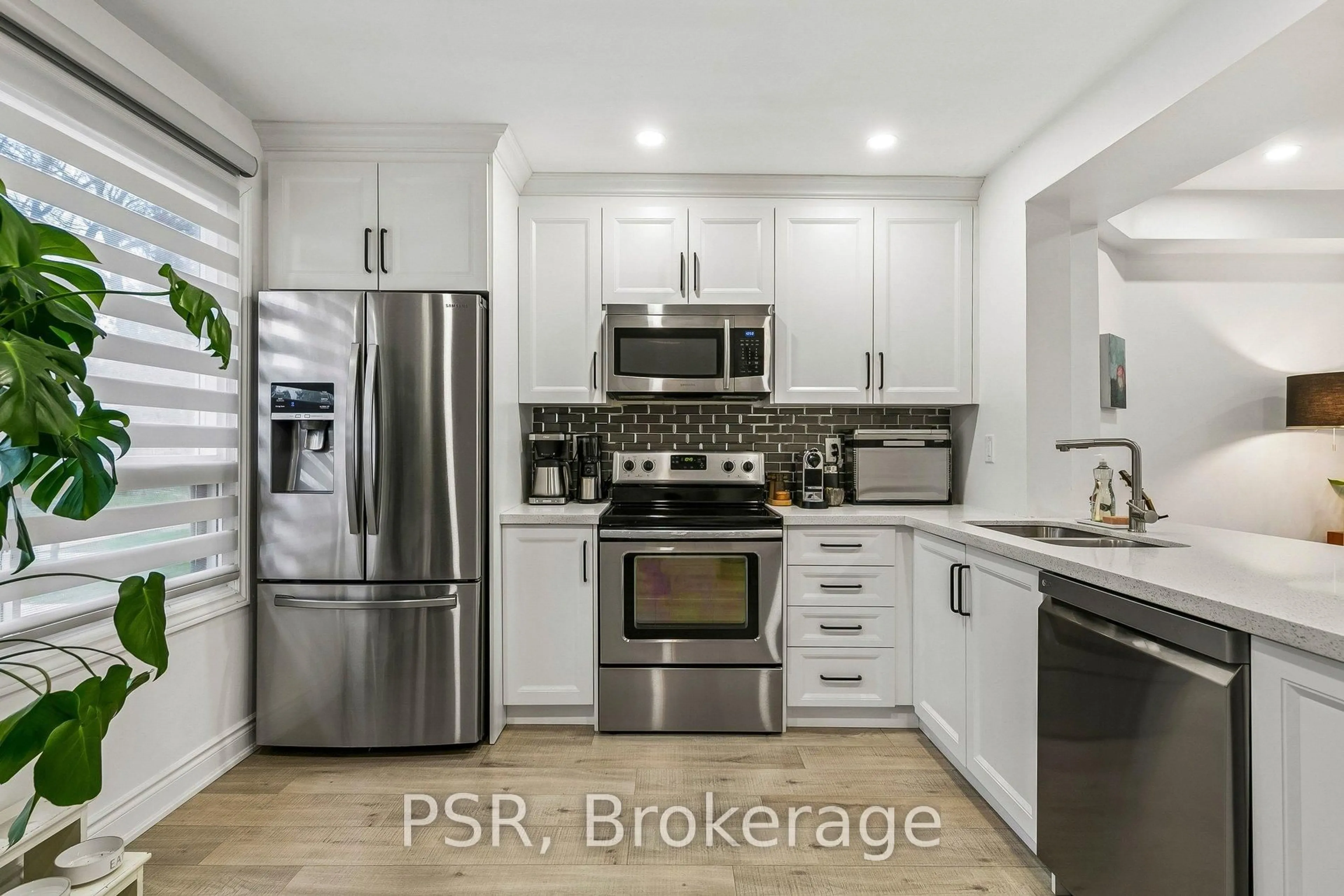 Open concept kitchen, unknown for 6540 Falconer Dr #104, Mississauga Ontario L5N 1M1