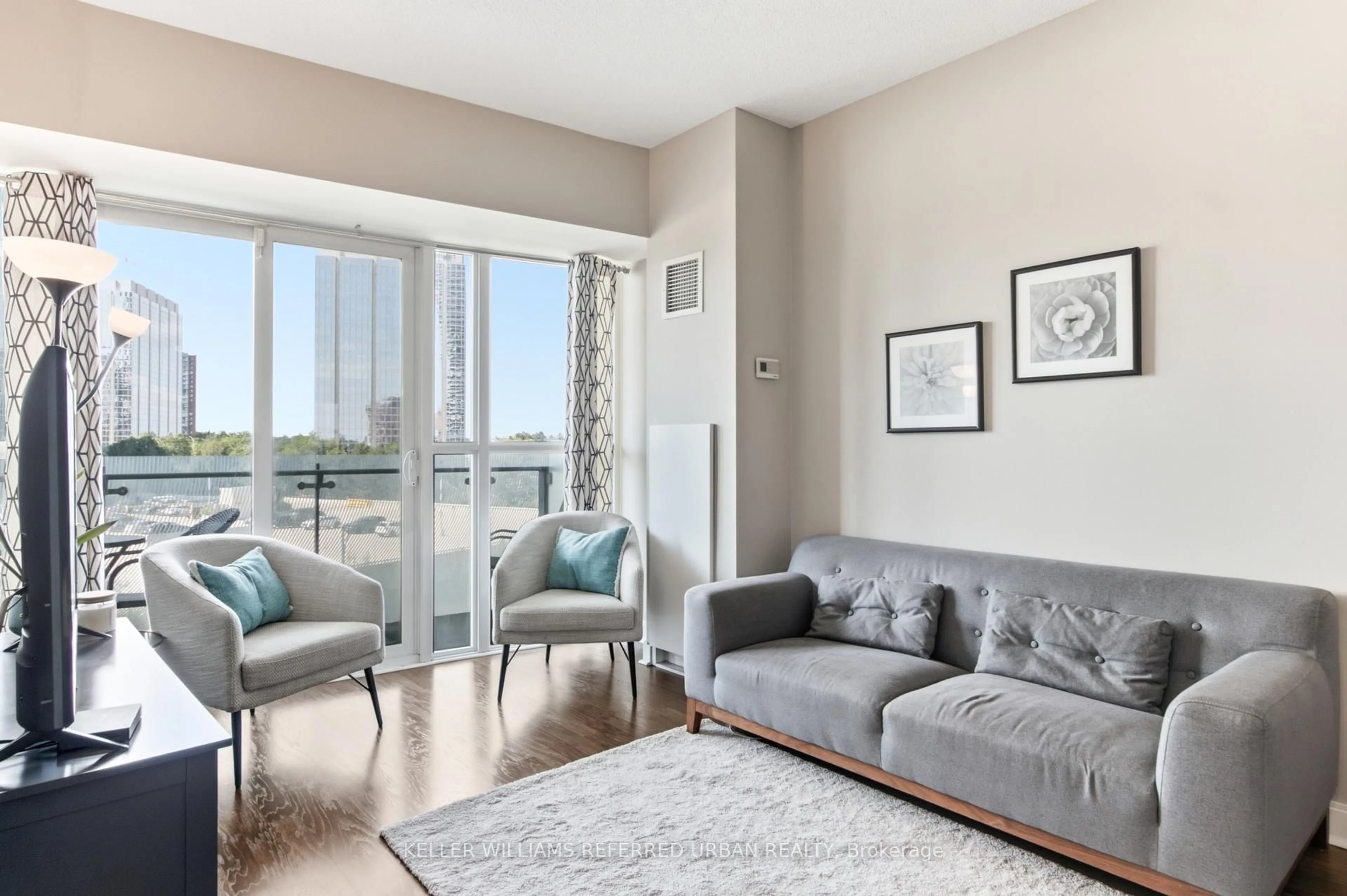 Living room with furniture, unknown for 50 Absolute Ave #401, Mississauga Ontario L4Z 0A8