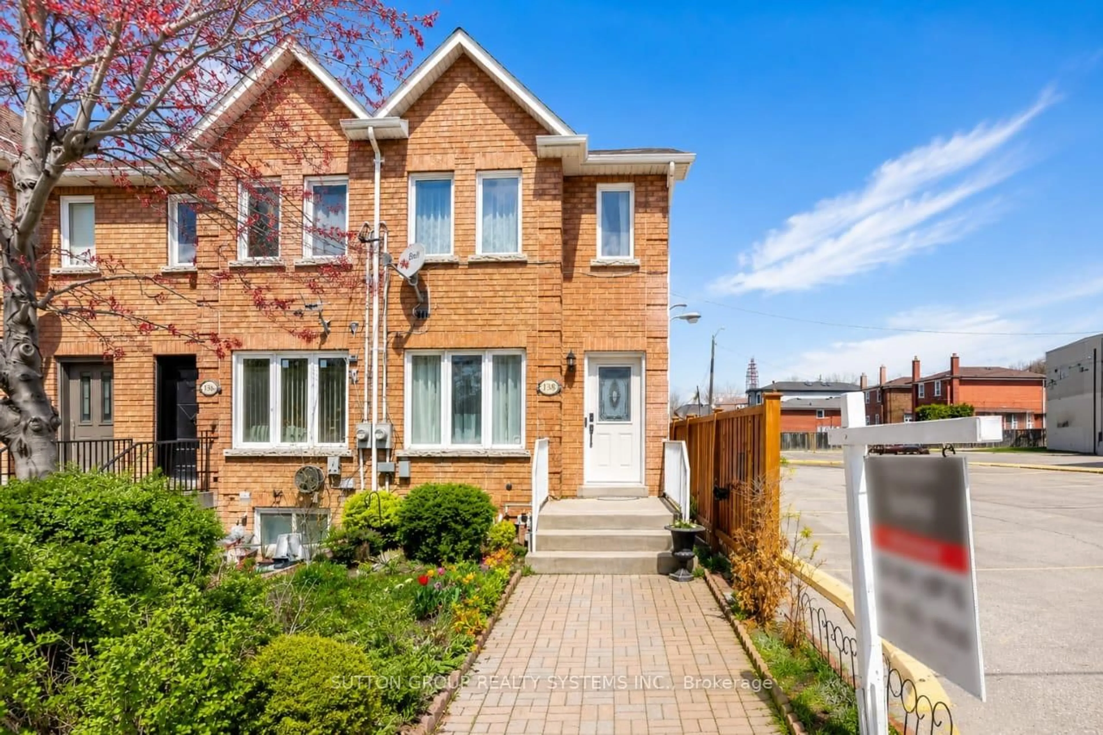 Home with brick exterior material, street for 2138 Eglinton Ave, Toronto Ontario M6E 2K8