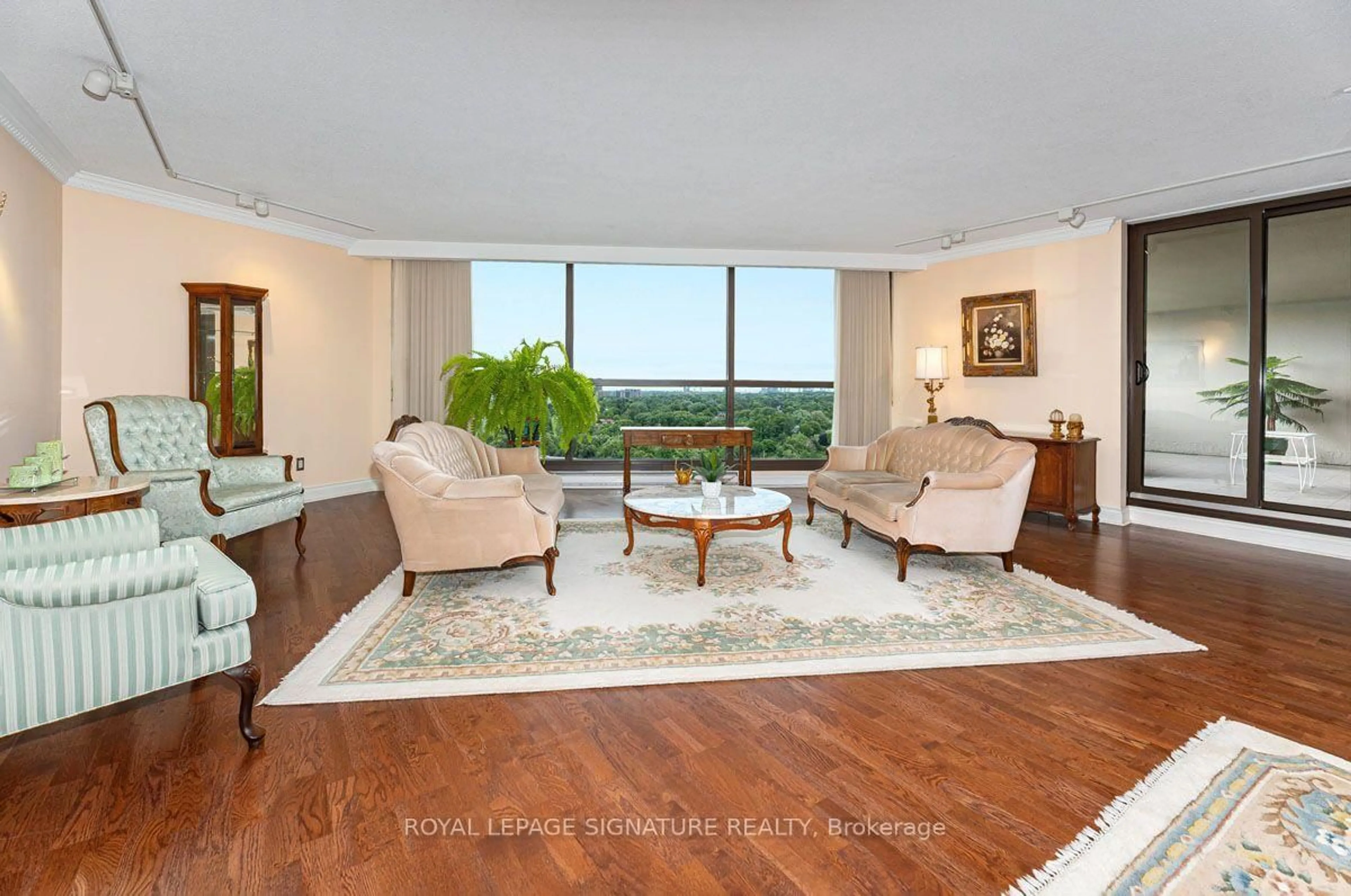 Living room with furniture, unknown for 2000 Islington Ave #1912, Toronto Ontario M9P 3S7