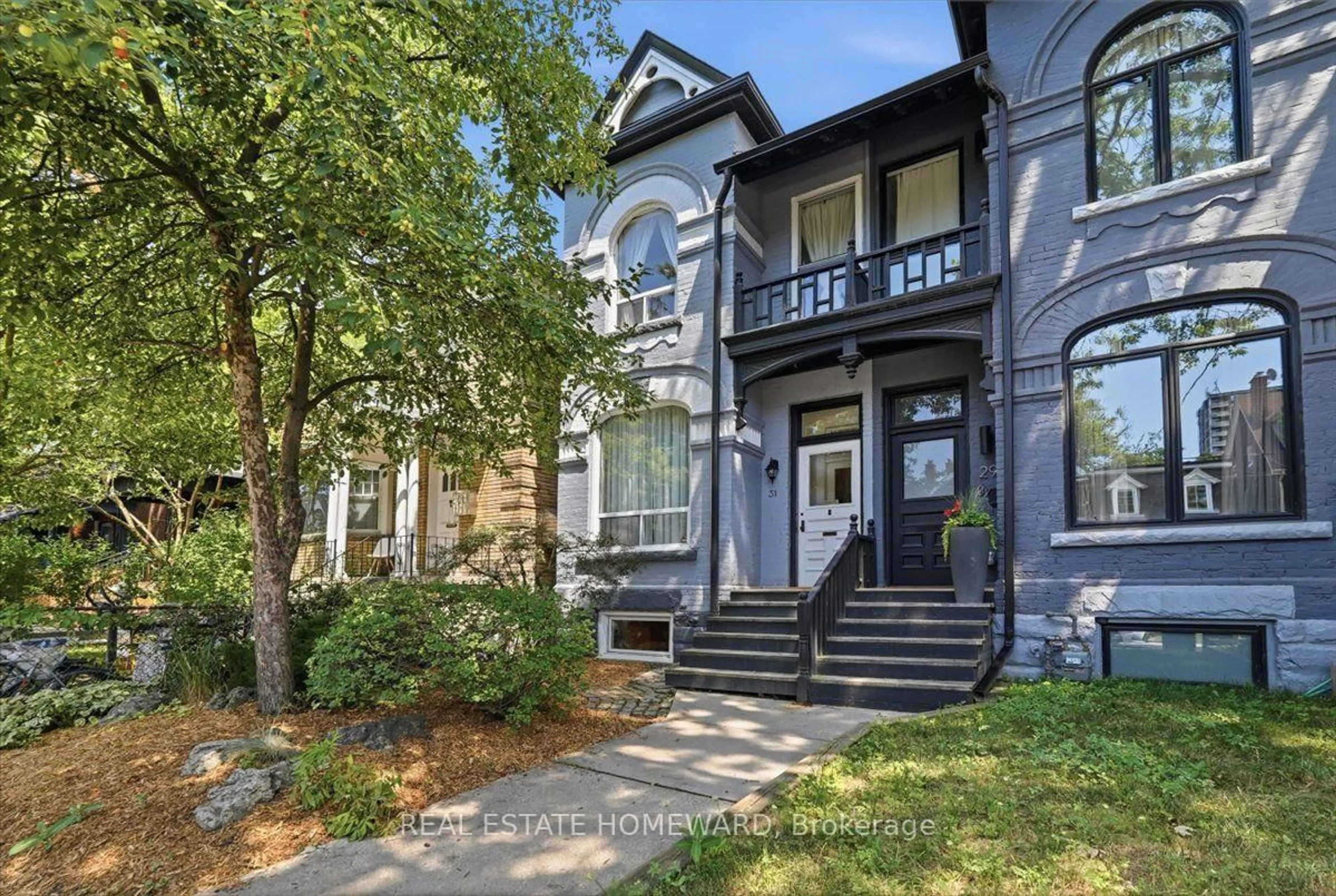 Home with brick exterior material, street for 31 Sorauren Ave, Toronto Ontario M6R 2C8