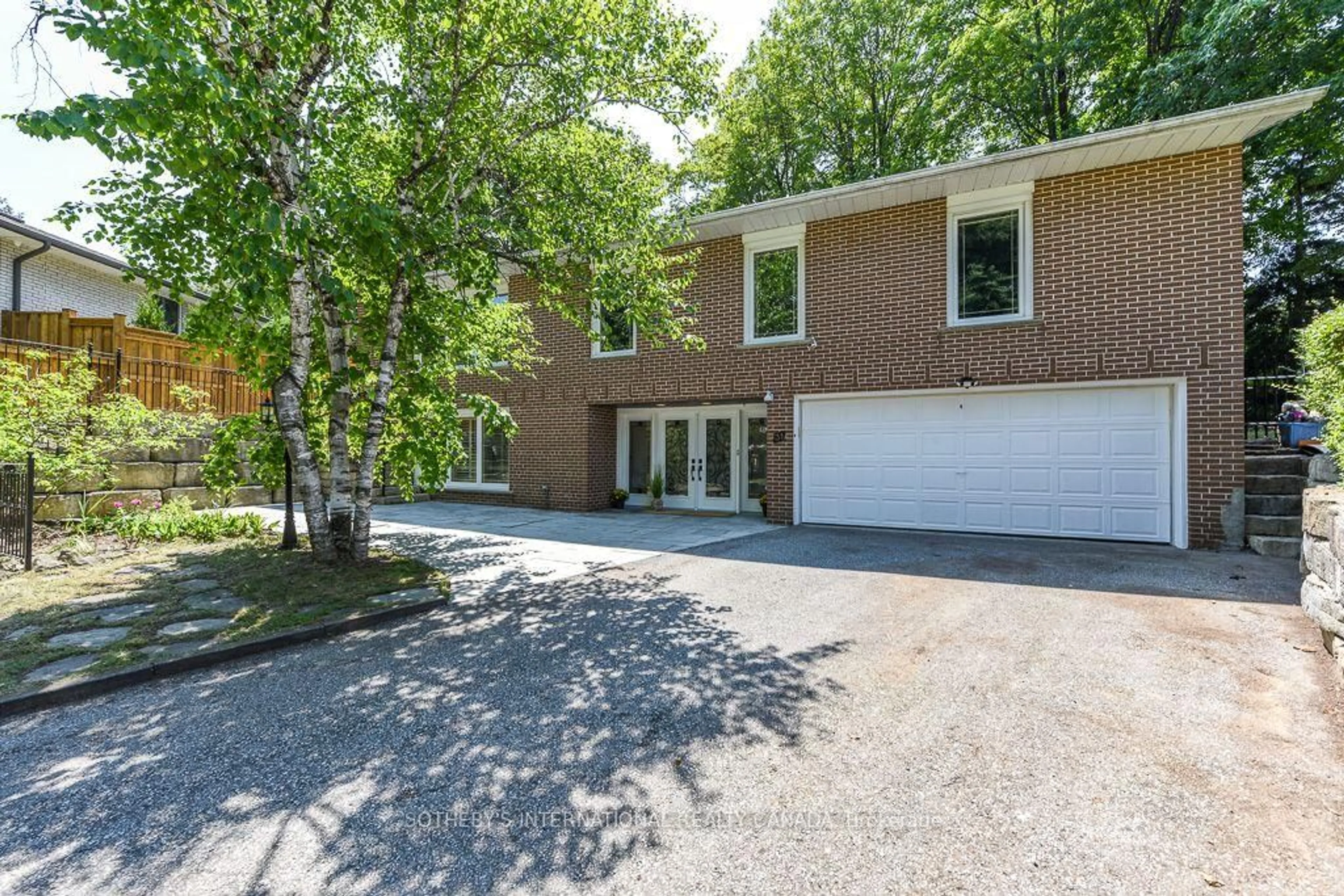 Home with brick exterior material, street for 31 Queensborough Cres, Toronto Ontario M9R 1A1