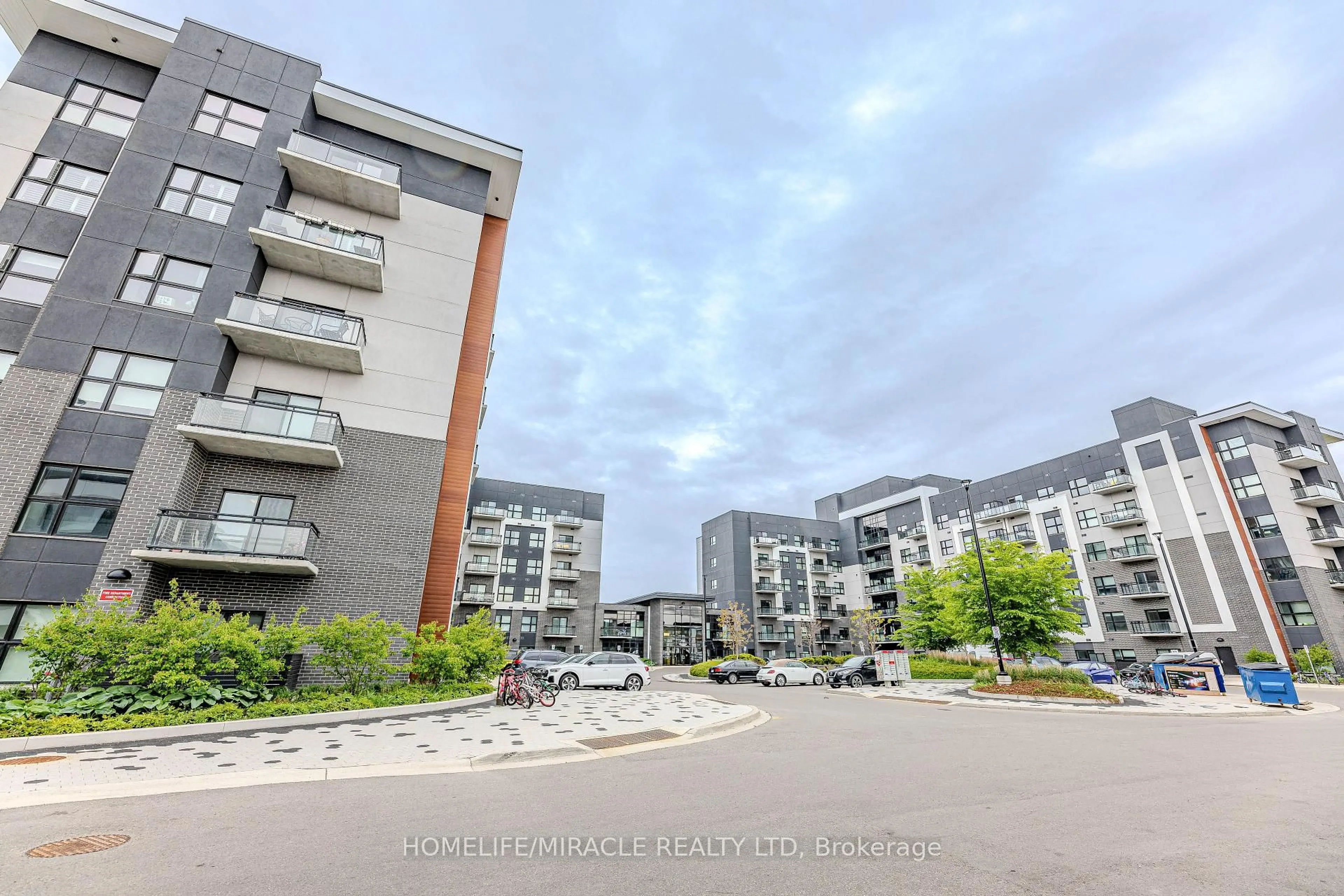 A pic from outside/outdoor area/front of a property/back of a property/a pic from drone, street for 102 Grovewood Common #215, Oakville Ontario L6H 0X2