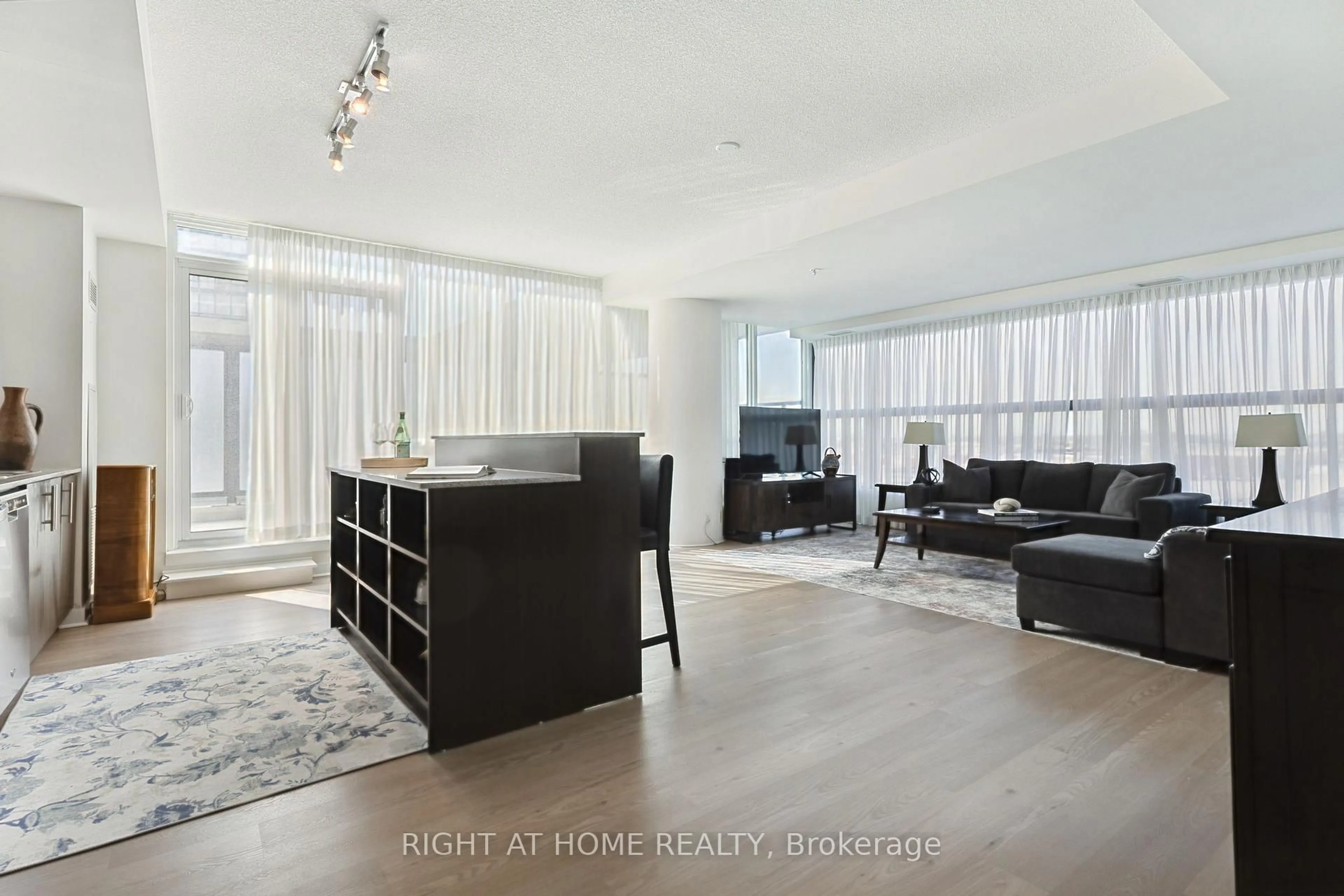 Living room with furniture, unknown for 3985 Grand Park Dr #302, Mississauga Ontario L5B 0H8
