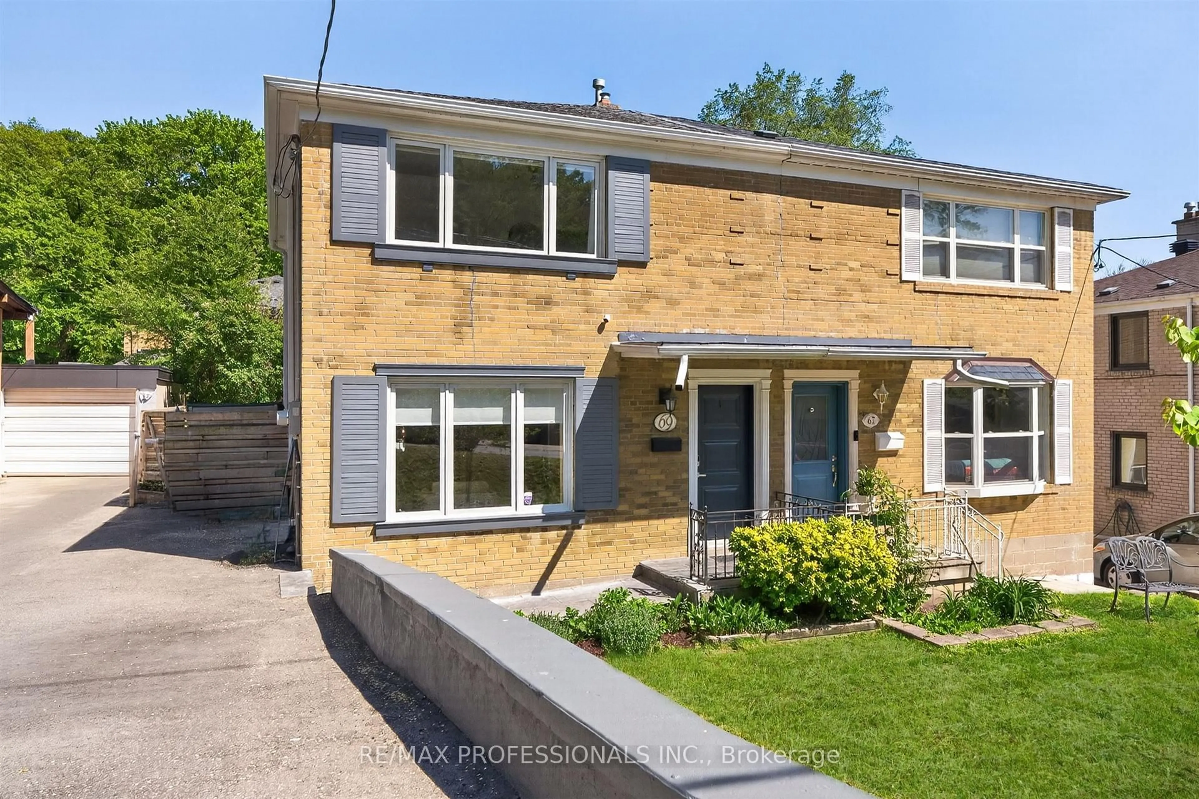 Home with brick exterior material, street for 69 Skylark Rd, Toronto Ontario M6S 4M5
