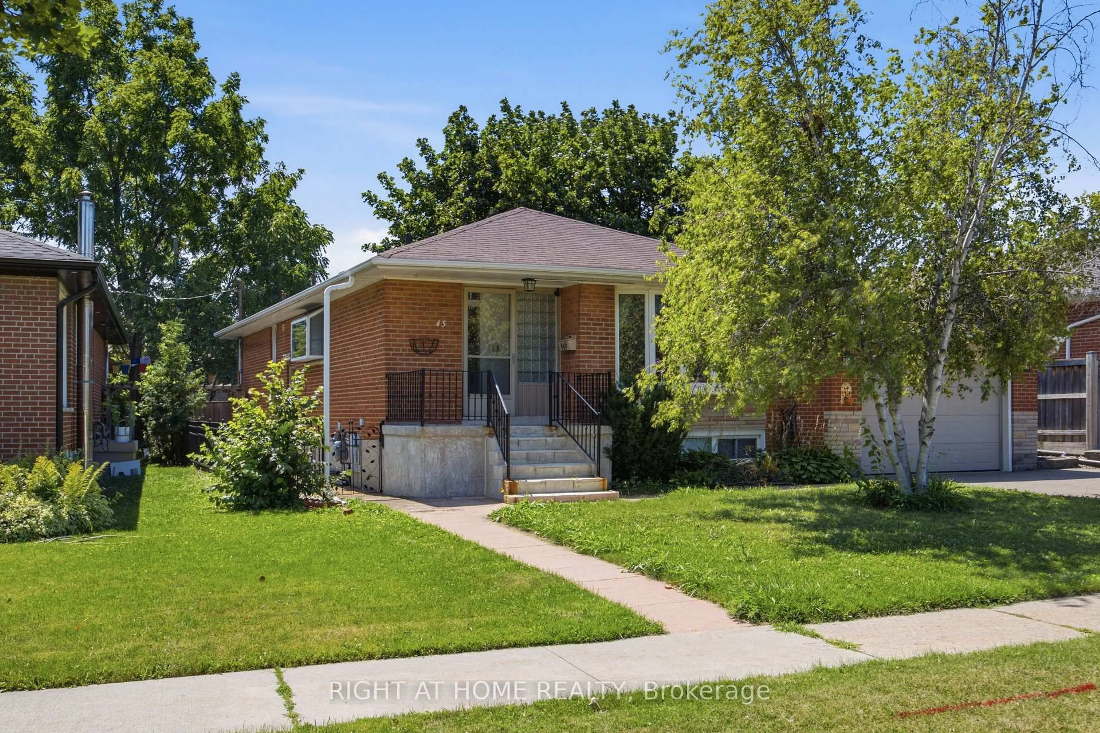 Home with brick exterior material, street for 45 Faversham Cres, Toronto Ontario M9C 3X7
