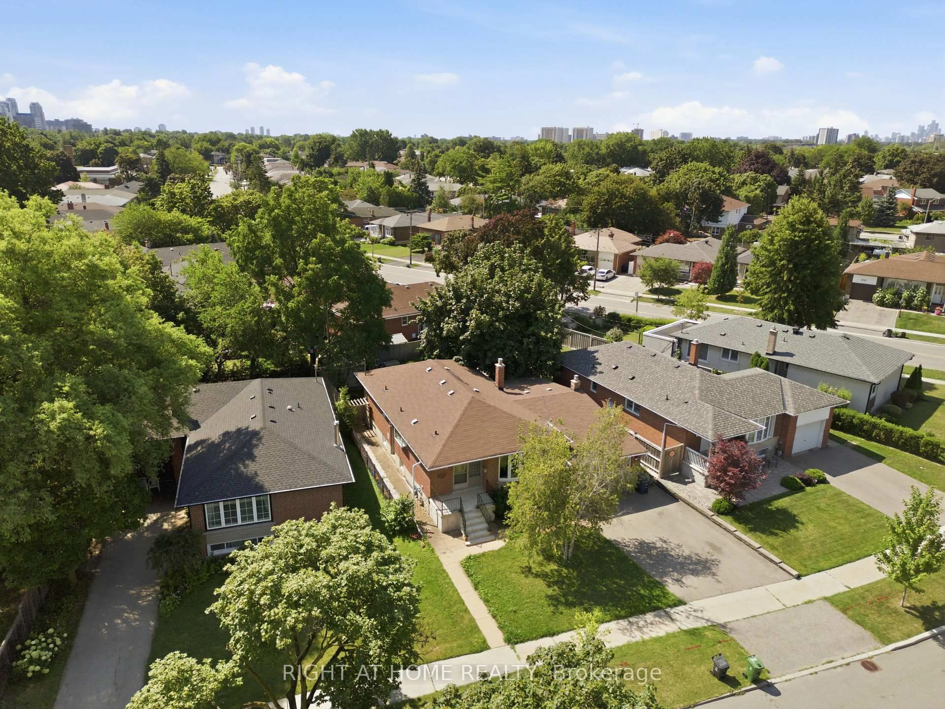 A pic from outside/outdoor area/front of a property/back of a property/a pic from drone, street for 45 Faversham Cres, Toronto Ontario M9C 3X7