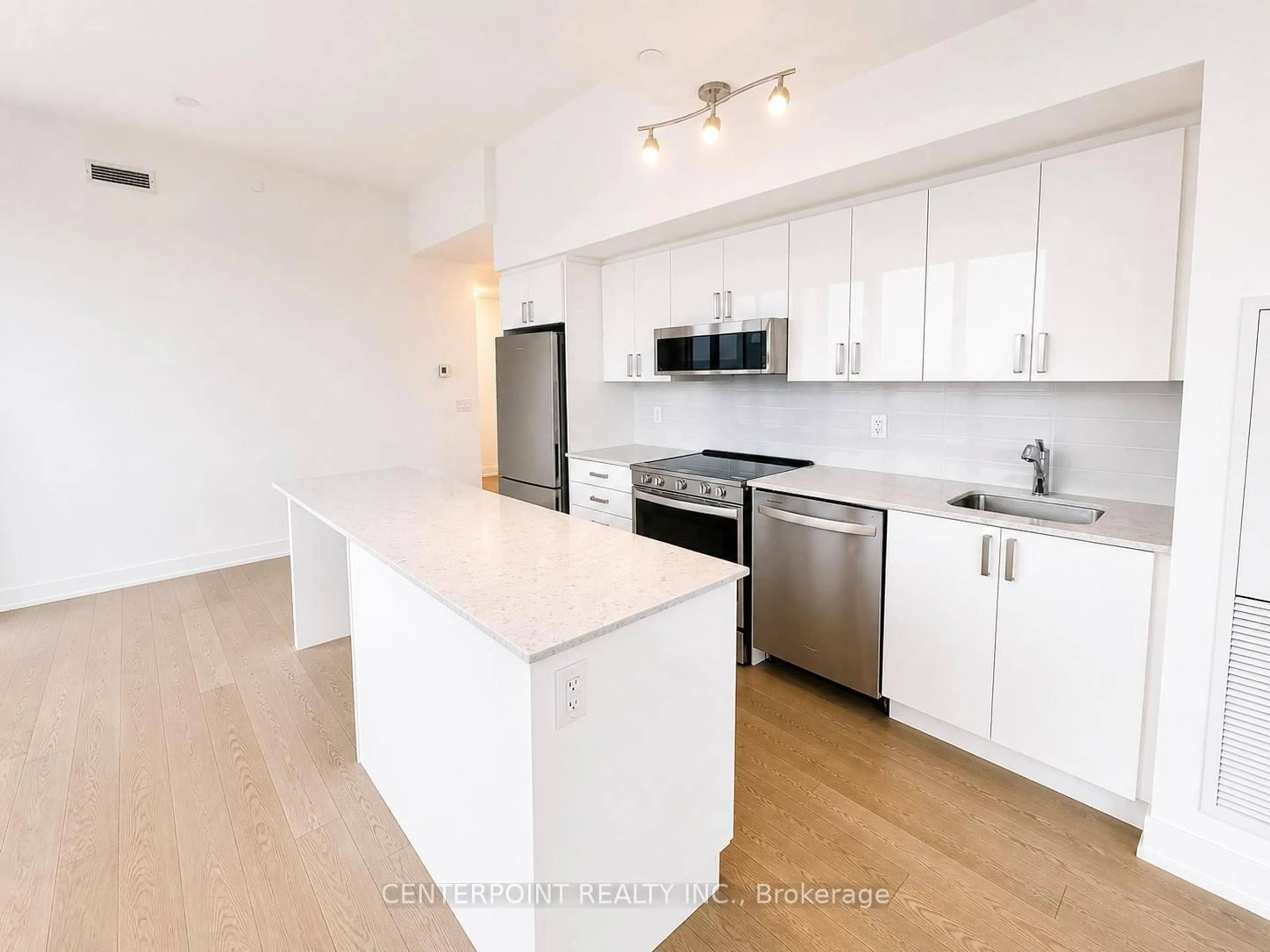 Open concept kitchen, unknown for 1063 Douglas McCurdy Common #803, Mississauga Ontario L5G 0C5