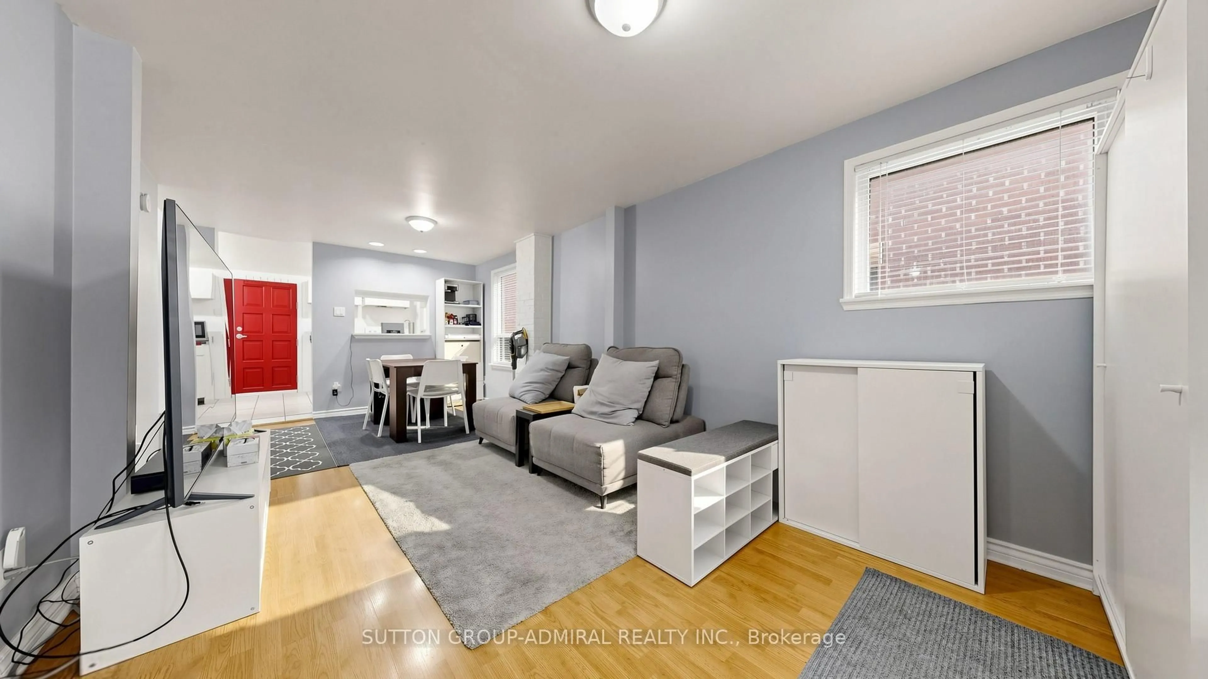 Living room with furniture, wood/laminate floor for 75 Rockcliffe Blvd, Toronto Ontario M6N 4R4
