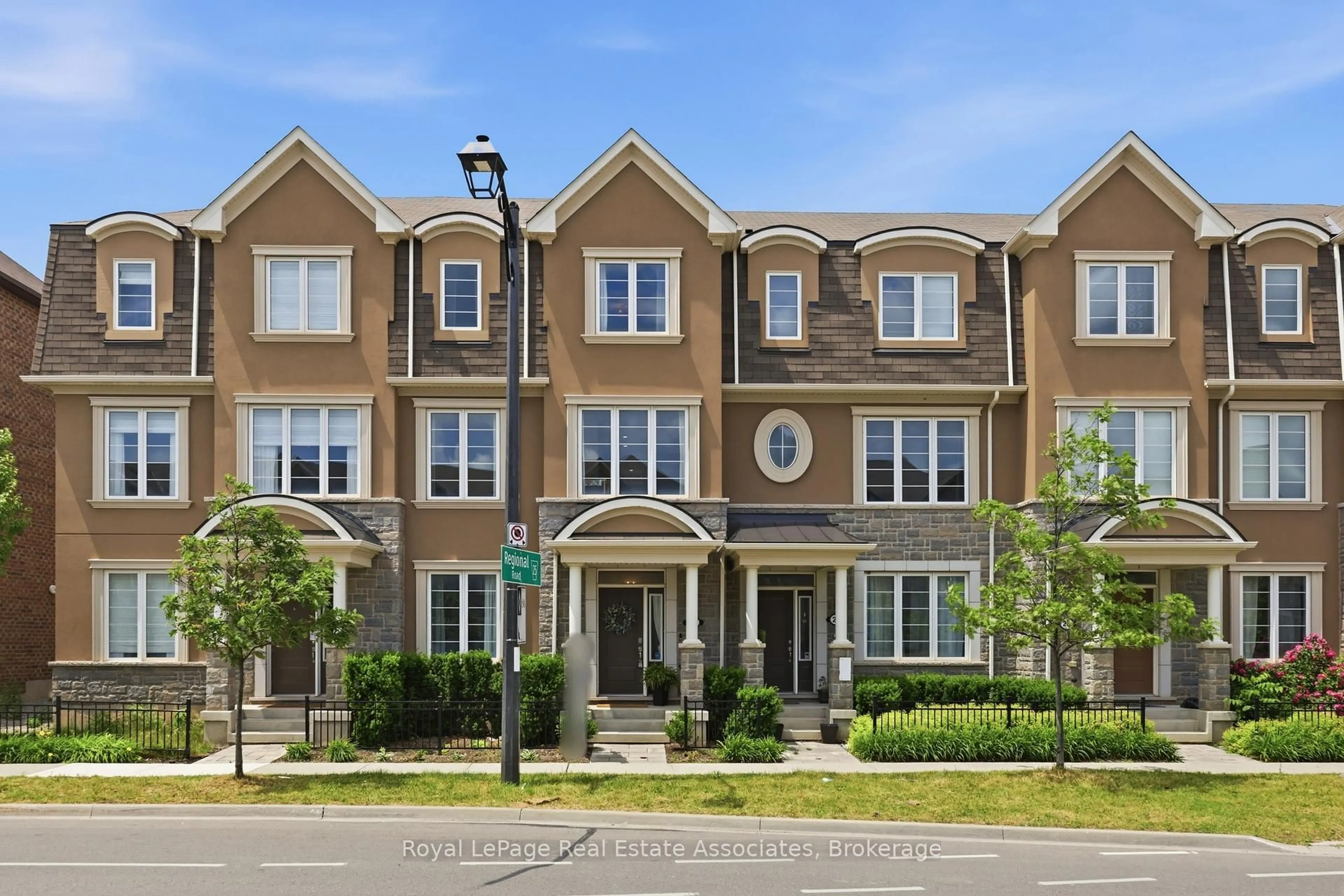 Home with brick exterior material, street for 1222 Rose Way #27, Milton Ontario L9E 1P2
