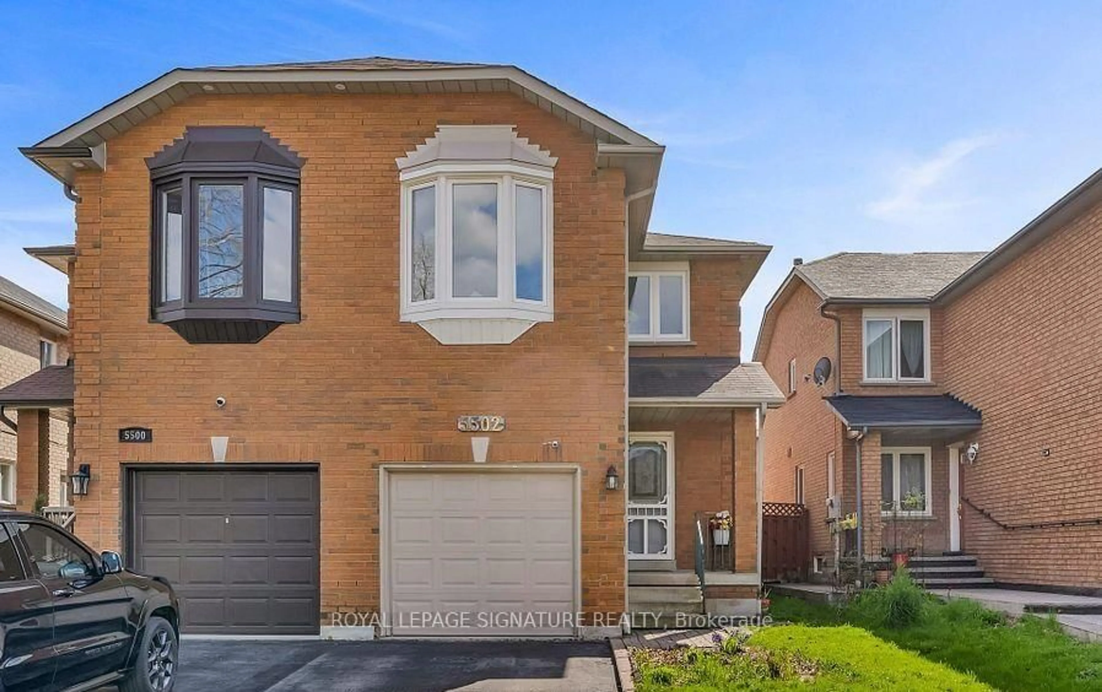 Home with brick exterior material, street for 5502 Cosmic Cres, Mississauga Ontario L4Z 3R9
