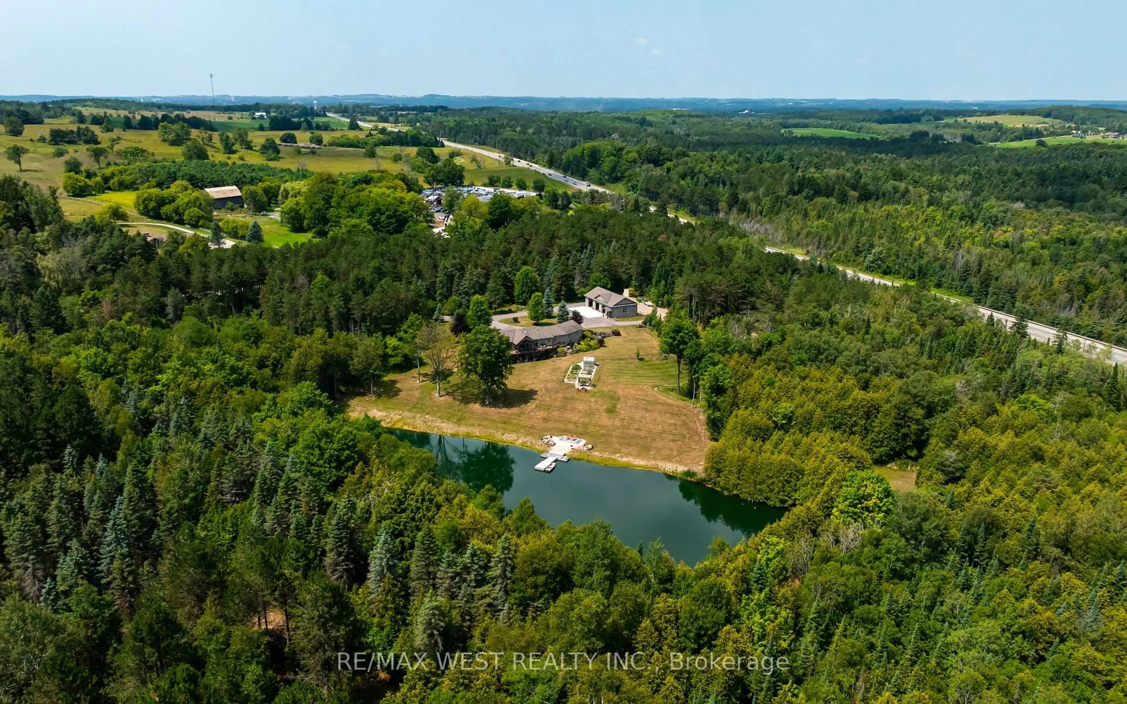 A pic from outside/outdoor area/front of a property/back of a property/a pic from drone, water/lake/river/ocean view for 20341 St Andrews Rd, Caledon Ontario L7K 2E6