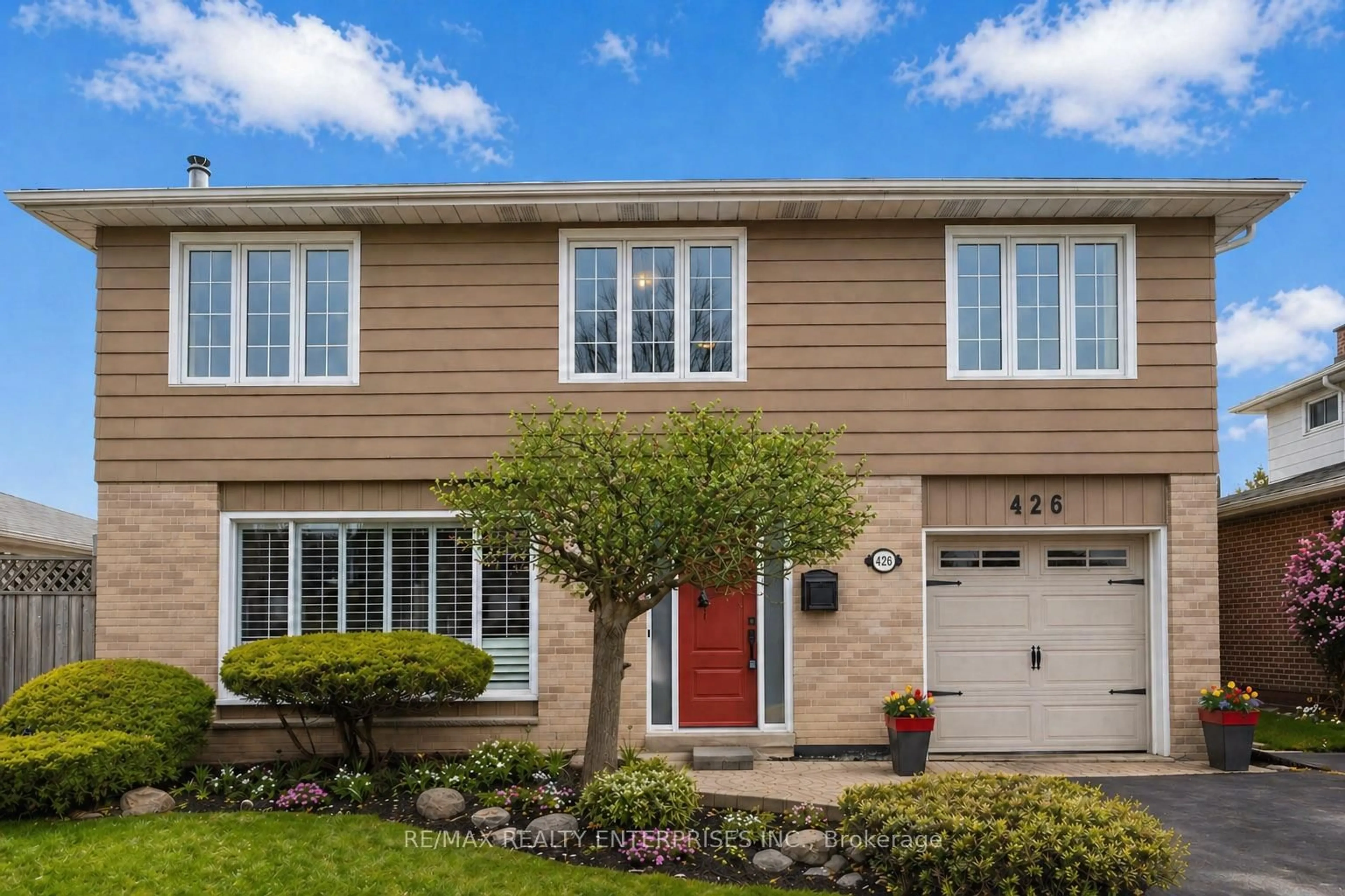 Home with vinyl exterior material, street for 426 Bartley Bull Pkwy, Brampton Ontario L6W 2M5