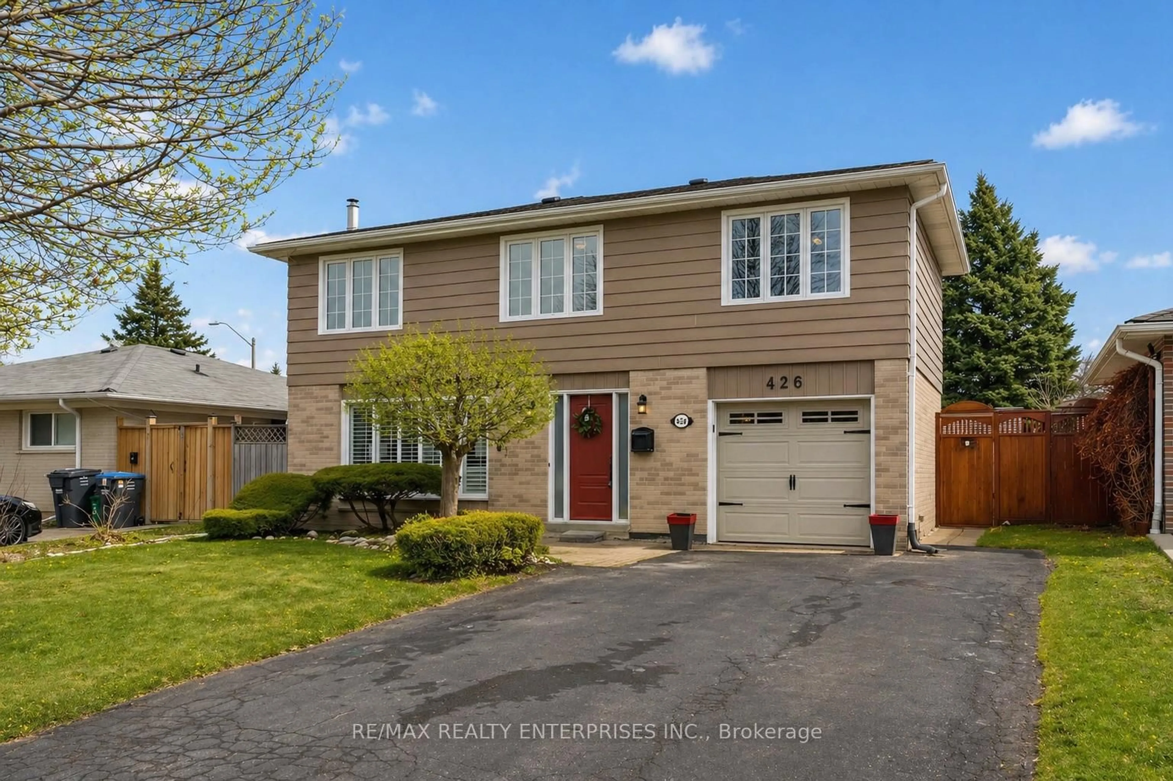 Home with vinyl exterior material, street for 426 Bartley Bull Pkwy, Brampton Ontario L6W 2M5