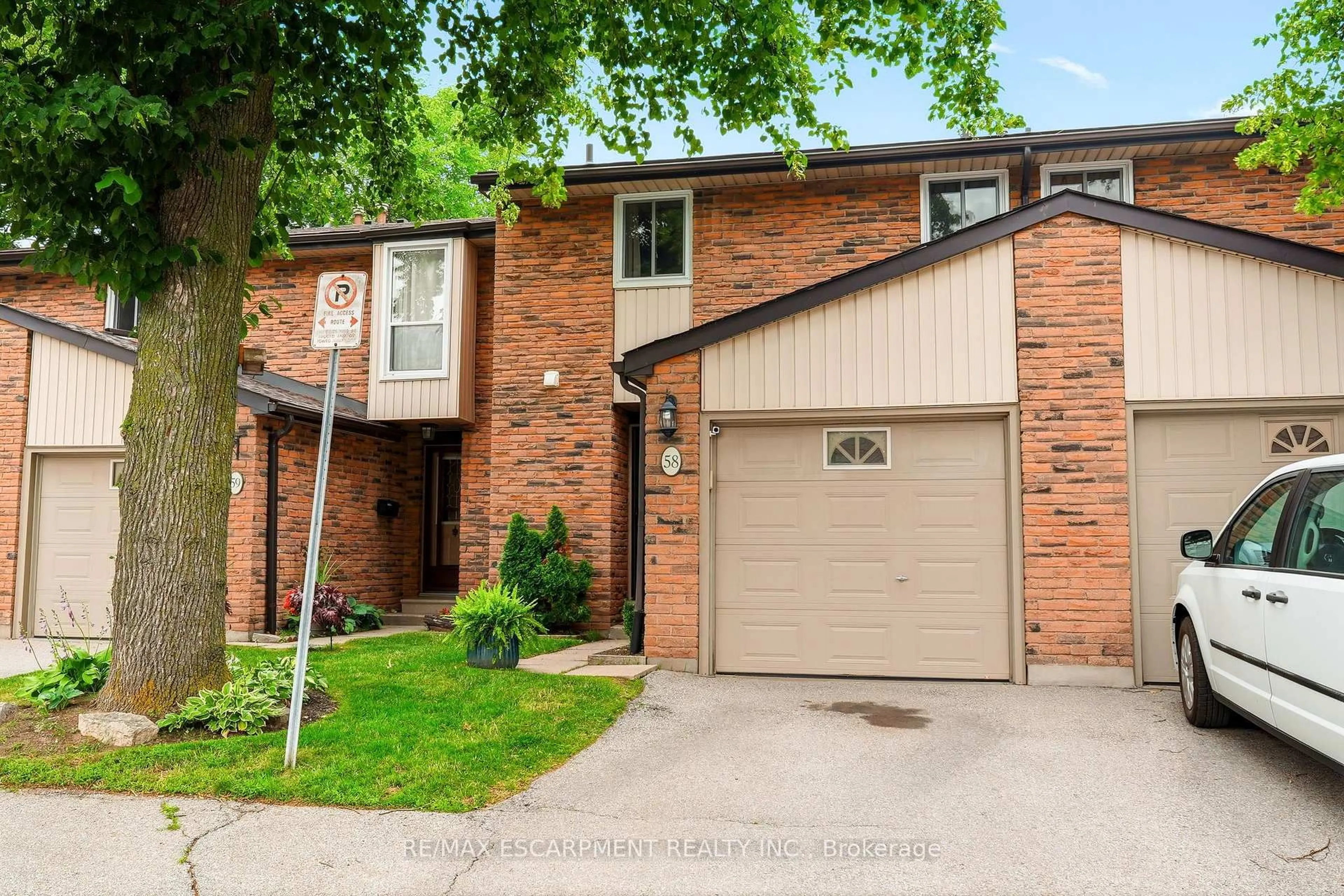 Home with brick exterior material, street for 660 Oxford Rd #58, Burlington Ontario L7N 3M1