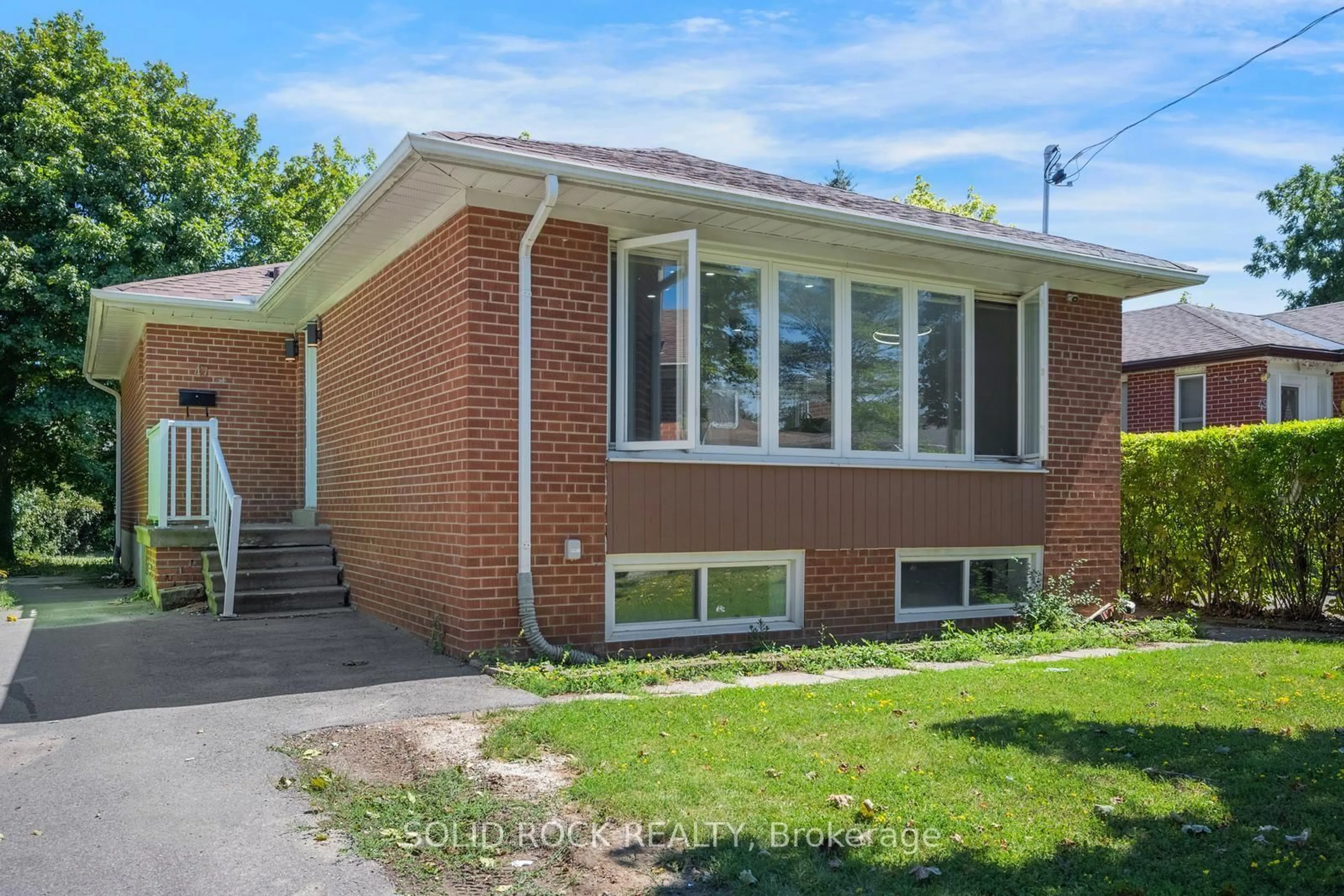Home with brick exterior material, street for 47 Brisco St, Brampton Ontario L6V 1X1