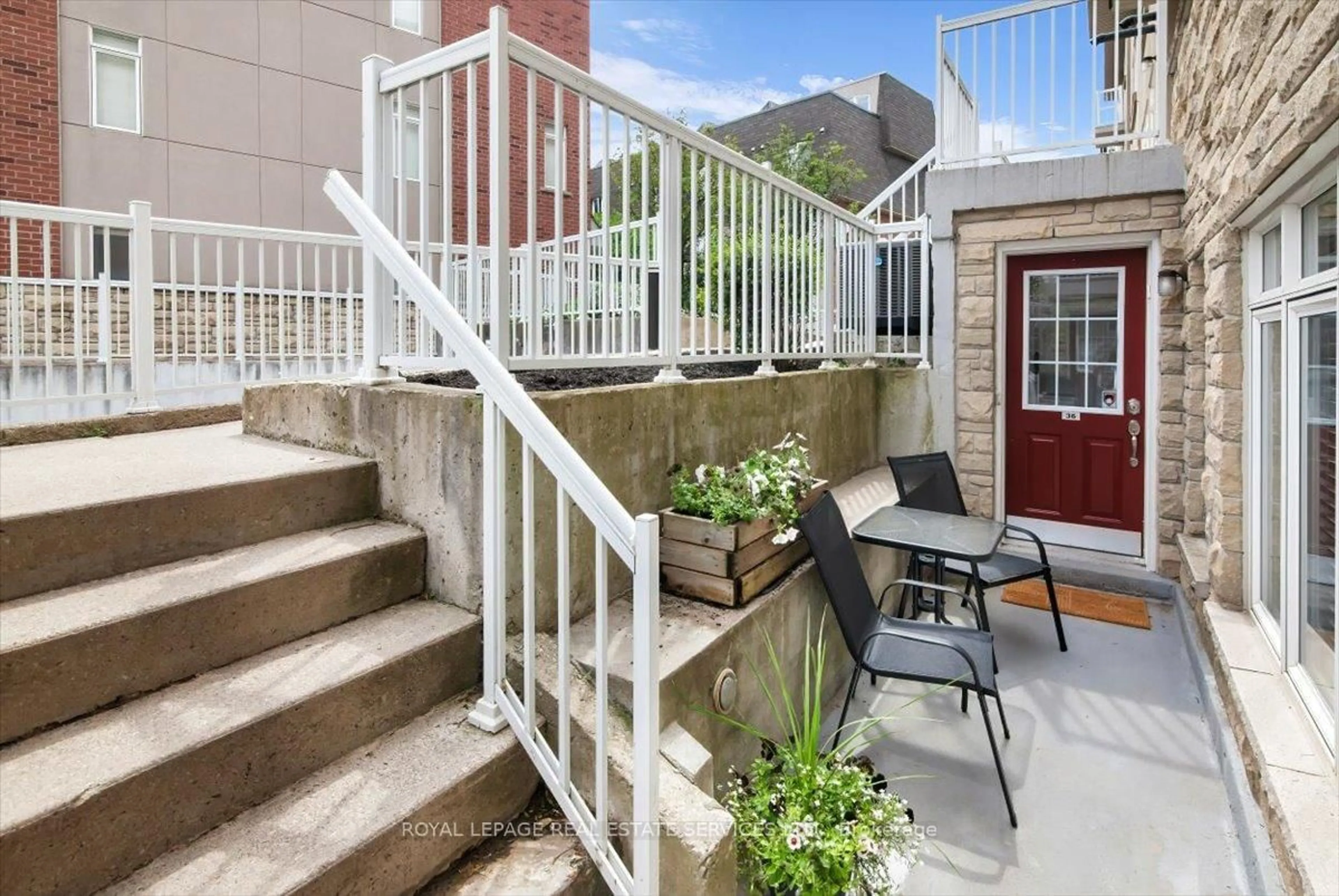 Patio, street for 30 Turntable Cres #36, Toronto Ontario M6H 4K9