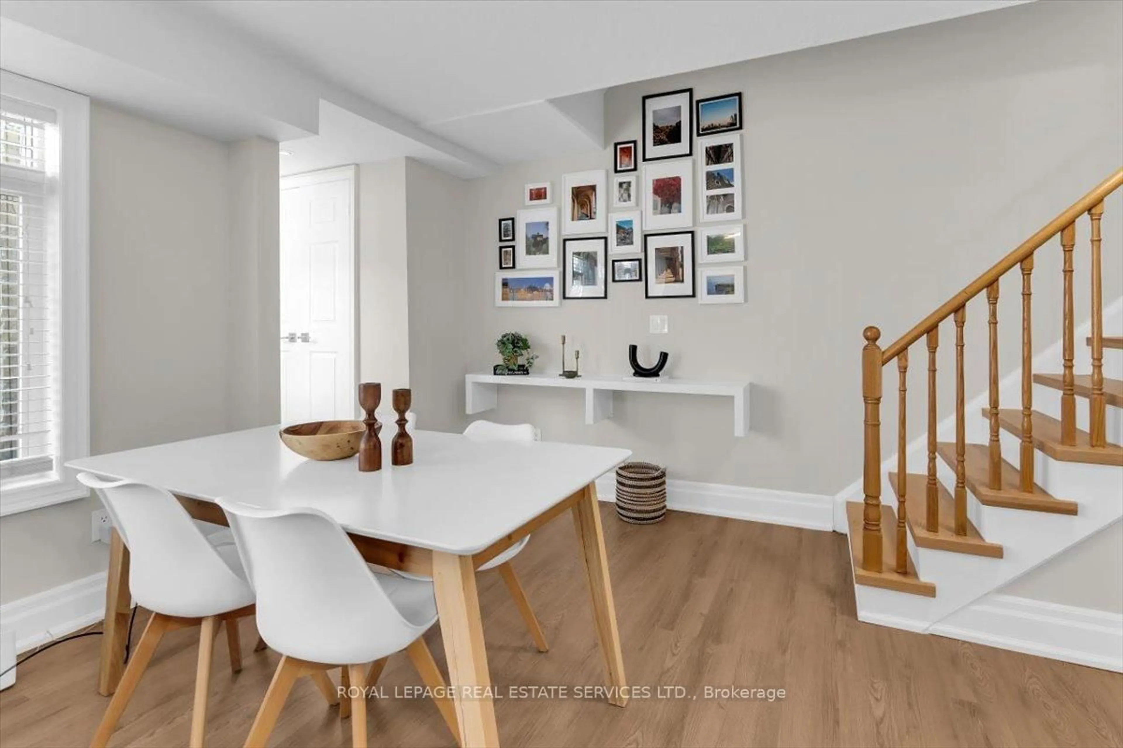 Dining room, wood/laminate floor for 30 Turntable Cres #36, Toronto Ontario M6H 4K9