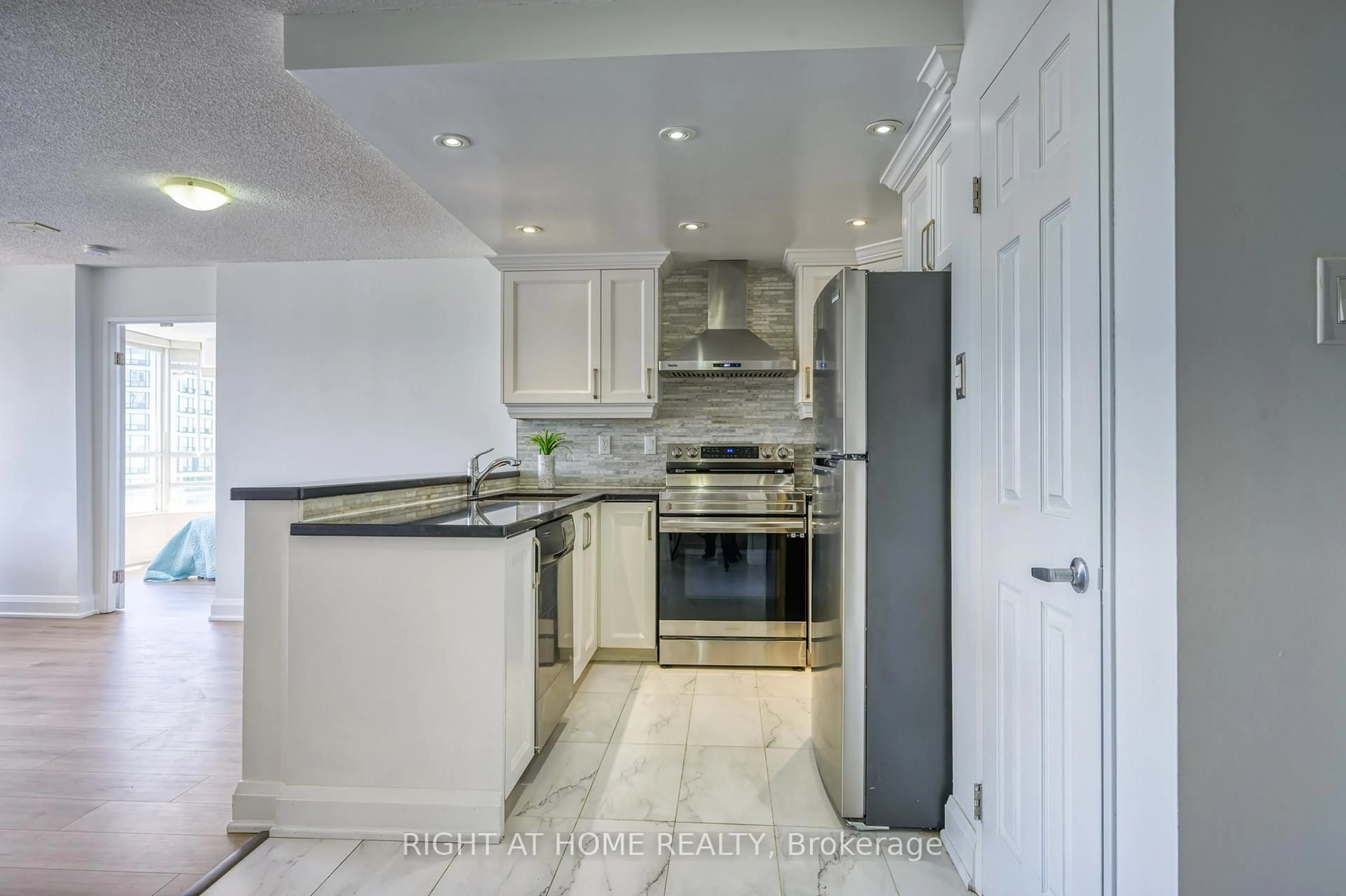 Contemporary kitchen, ceramic/tile floor for 50 Kingsbridge Garden Circ #1408, Mississauga Ontario L5R 1Y2
