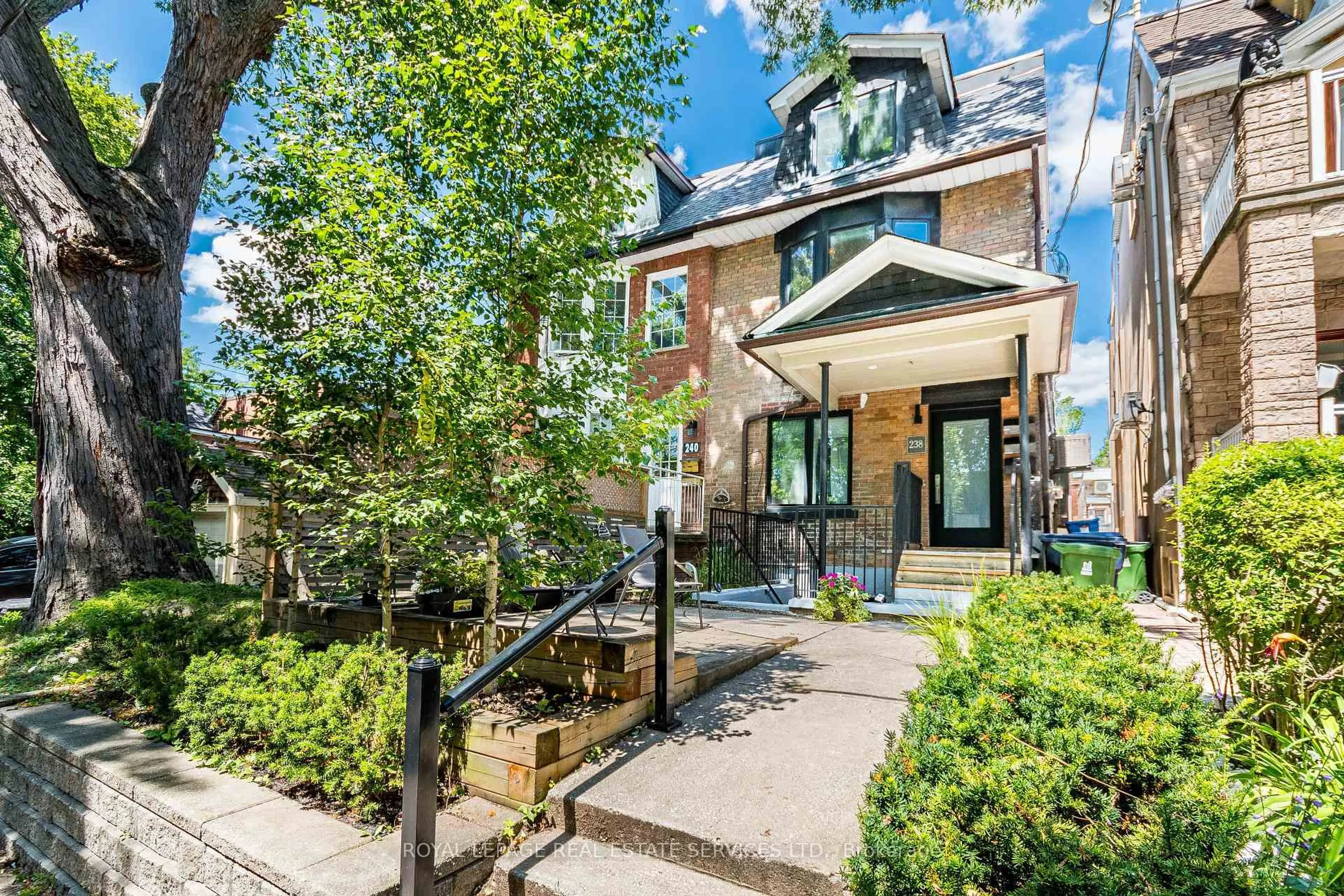 Home with brick exterior material, street for 238 Garden Ave, Toronto Ontario M6R 1J1
