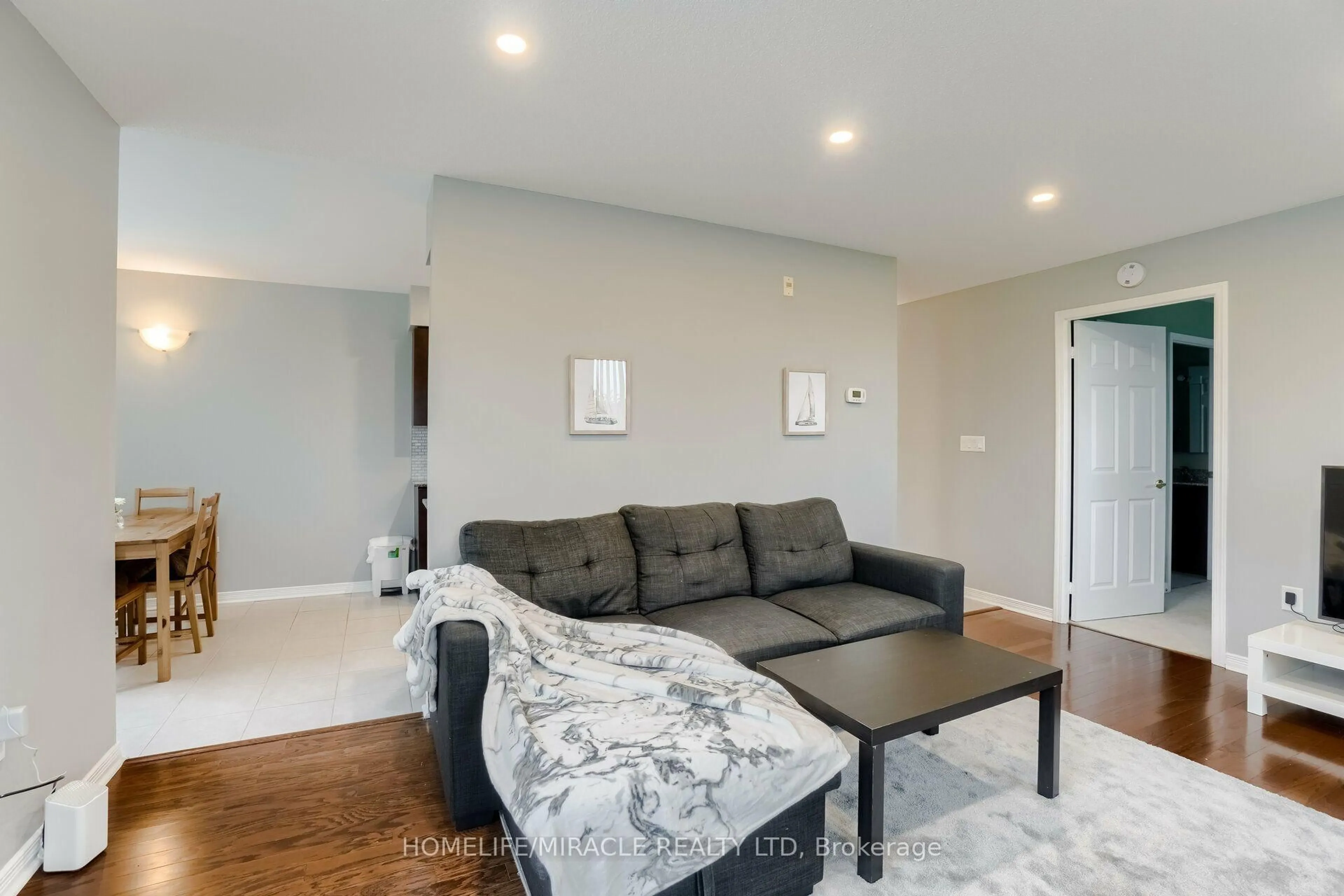 Living room with furniture, unknown for 55 Via Rosedale Rd #105, Brampton Ontario L6R 0V1