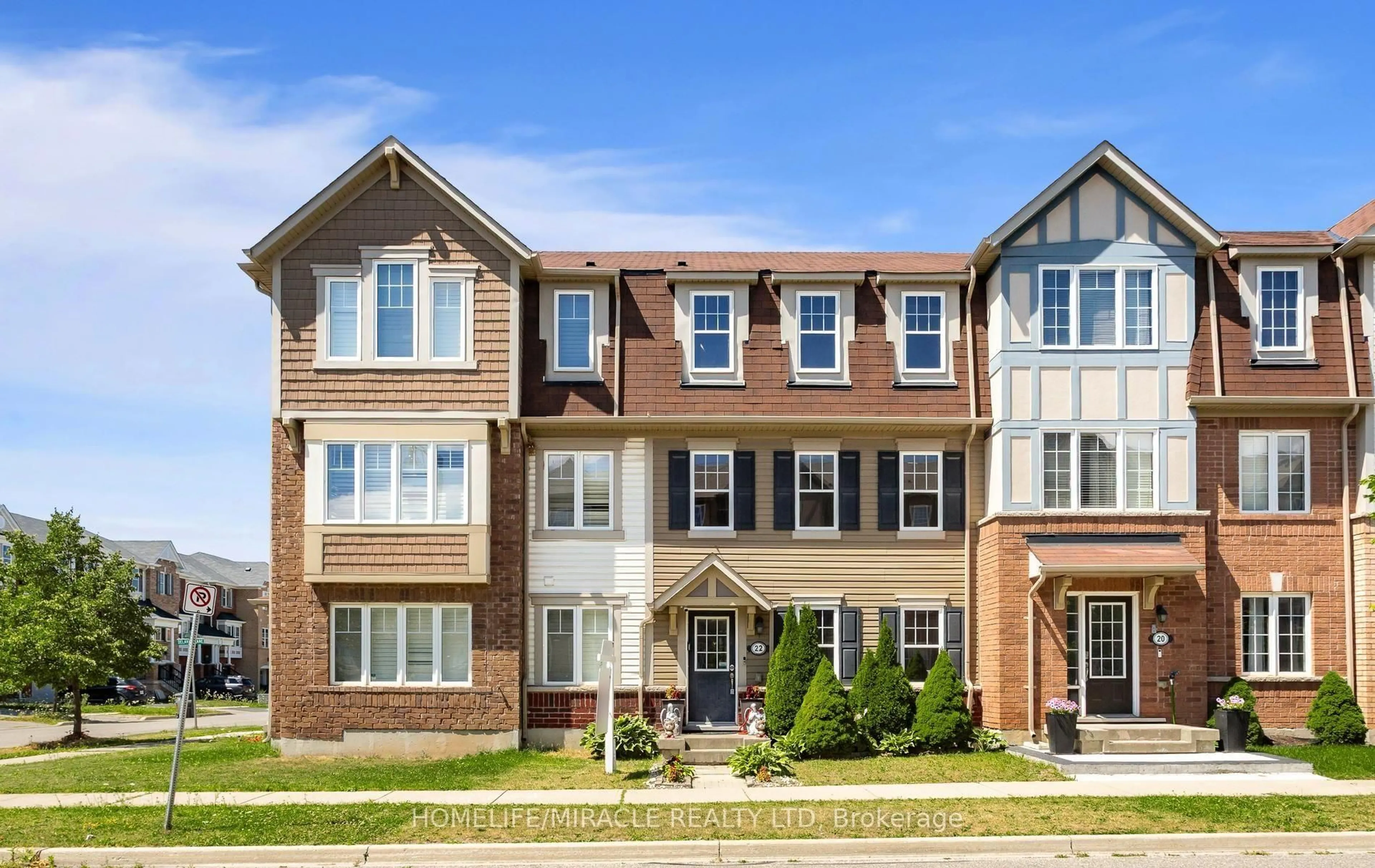 Home with brick exterior material, street for 22 Crossbill Rd, Brampton Ontario L7A 0S5