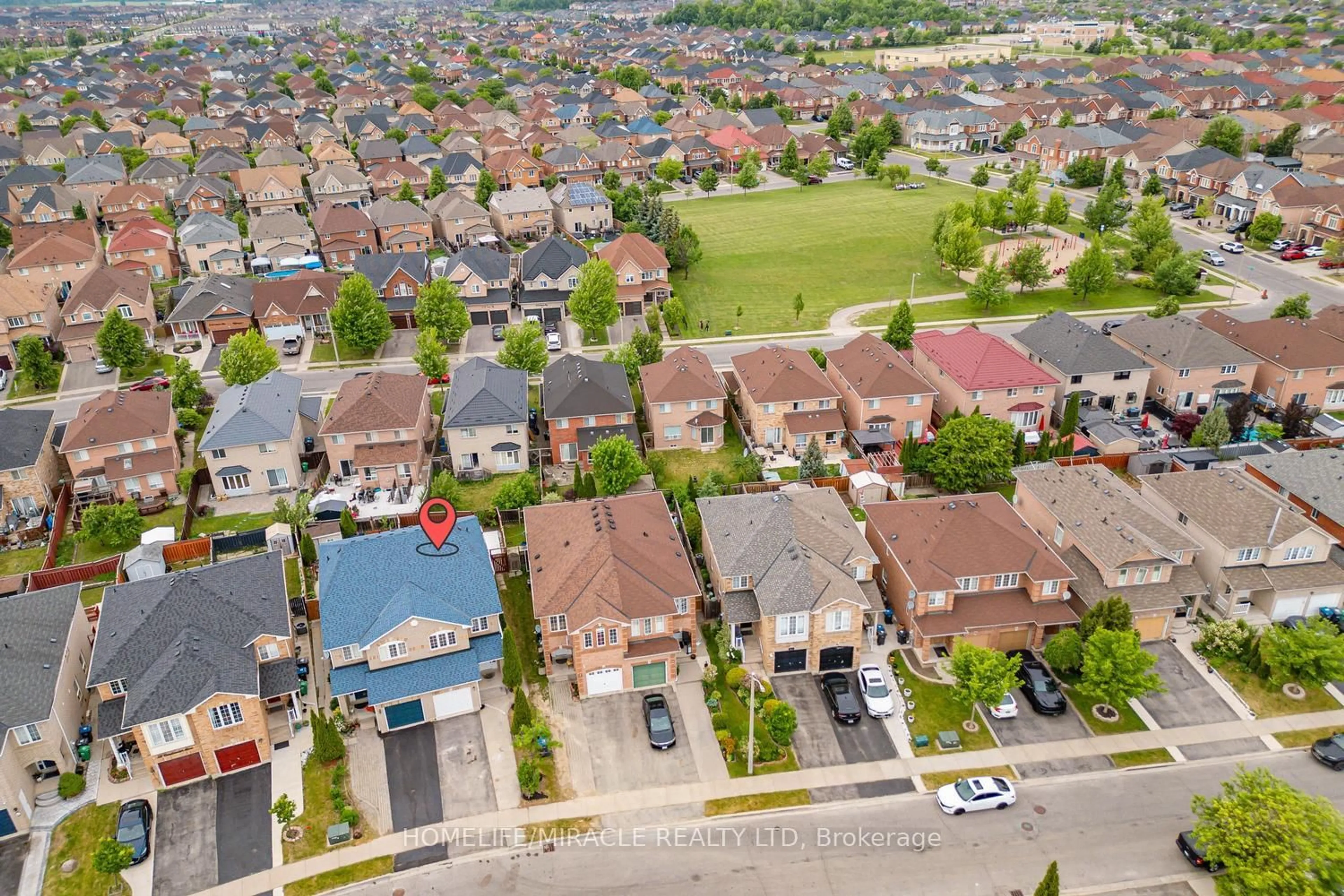 A pic from outside/outdoor area/front of a property/back of a property/a pic from drone, street for 26 Roadmaster Lane, Brampton Ontario L7A 3A9