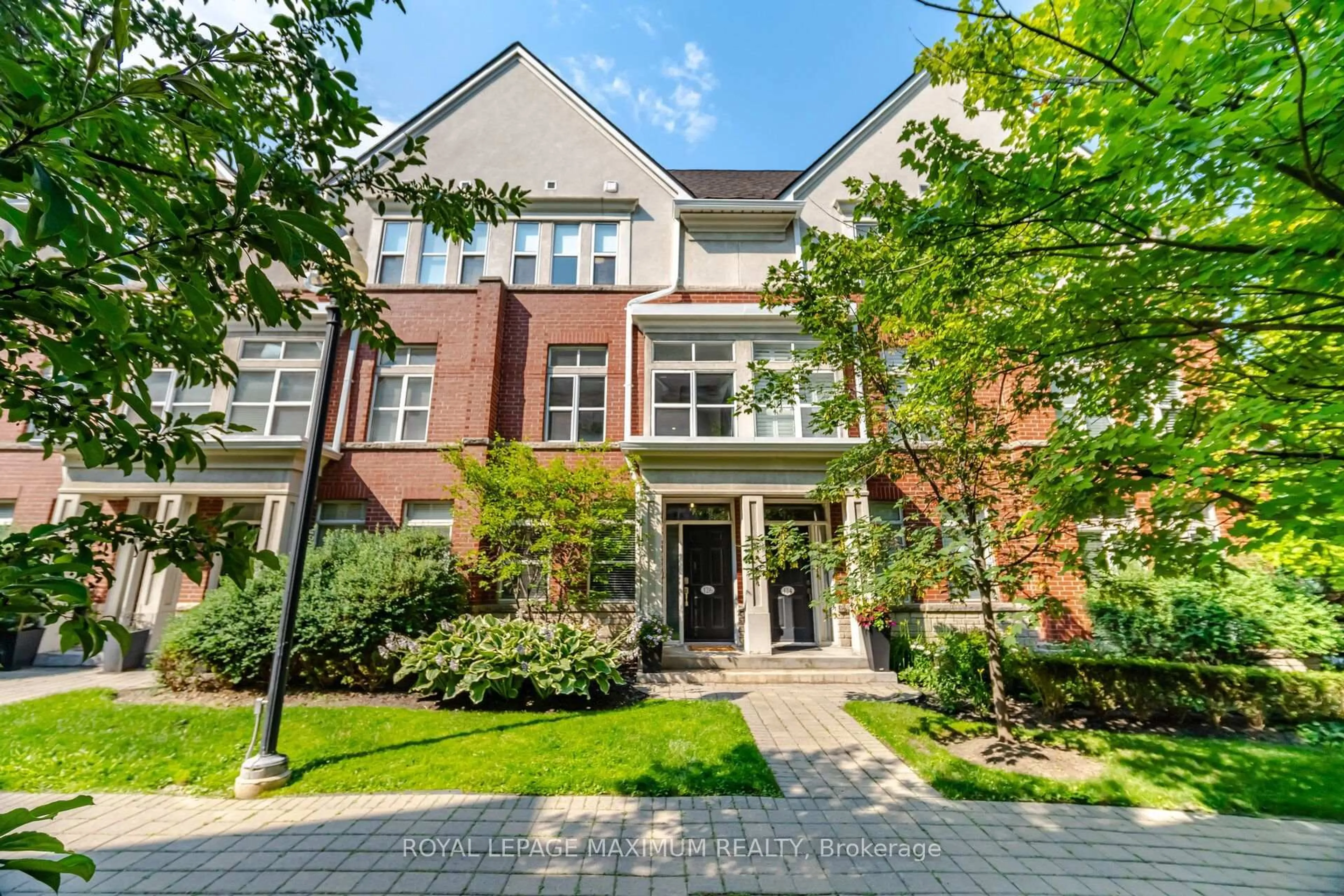 Home with brick exterior material, street for 126 Resurrection Rd, Toronto Ontario M9A 5H1