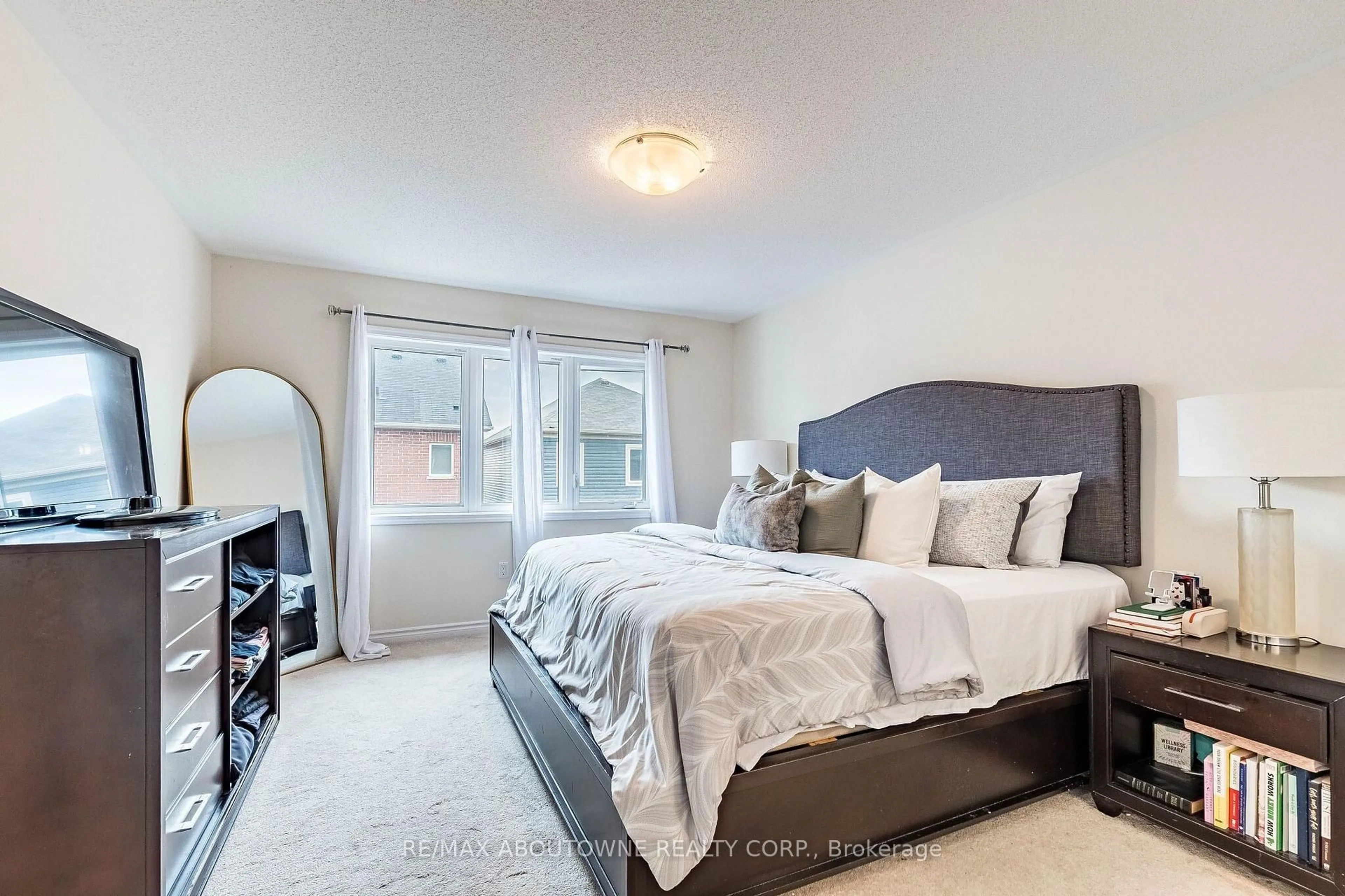 Bedroom with bed, carpet floor for 1239 Mulroney Hts, Milton Ontario L9E 1G1