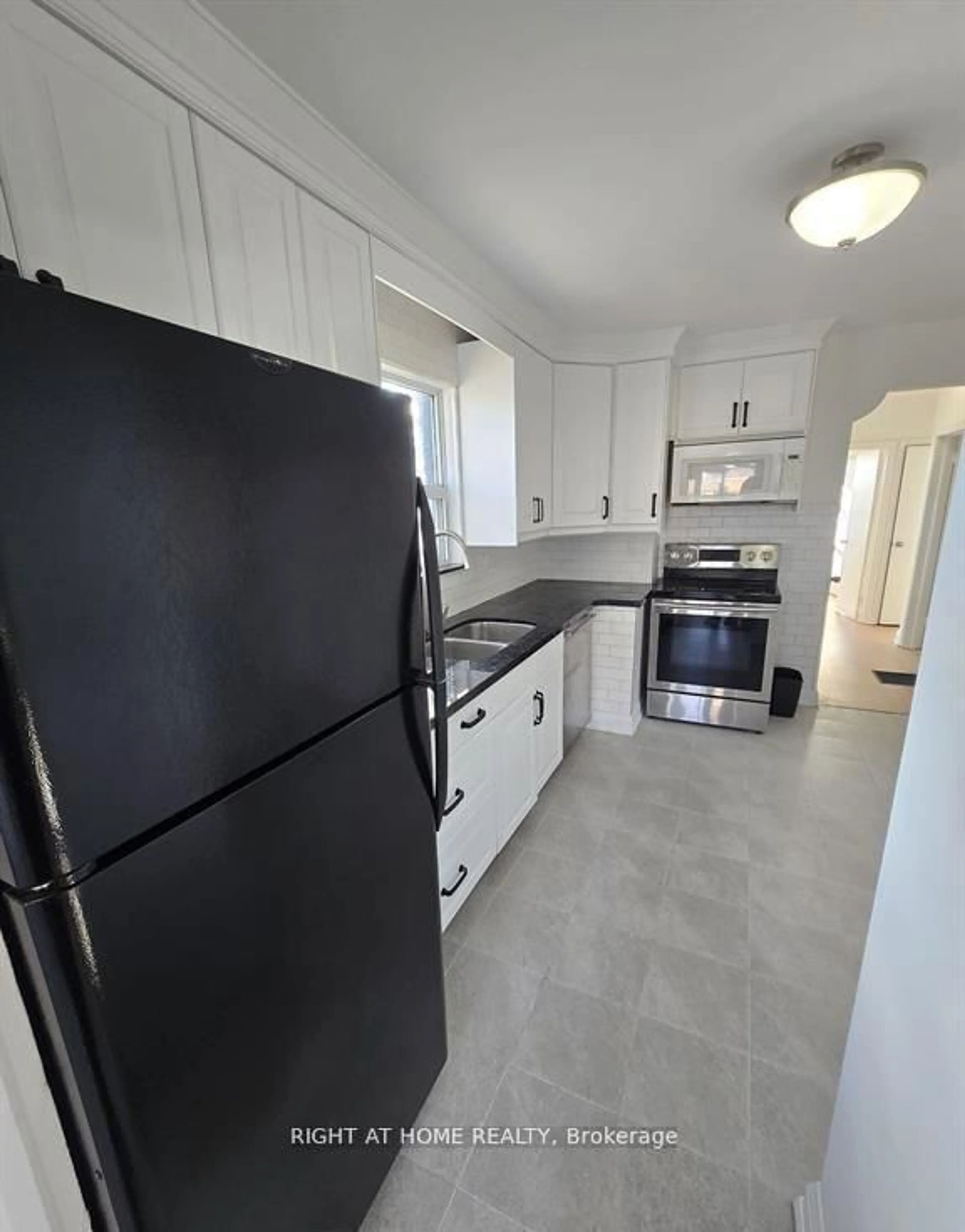 Standard kitchen, ceramic/tile floor for 70 Bunnell Cres, Toronto Ontario M3M 2C1