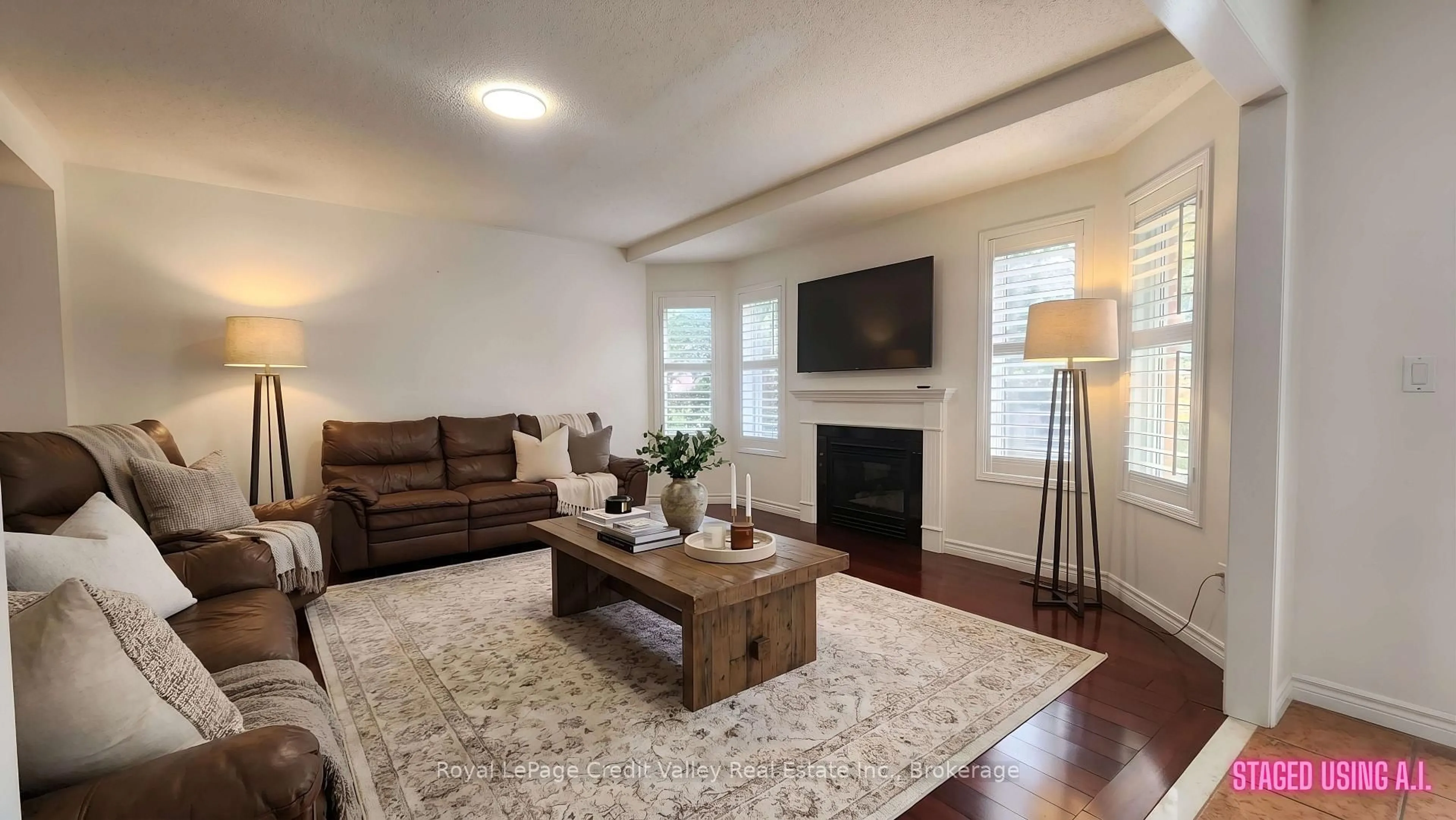 Living room with furniture, wood/laminate floor for 15 Courtsfield Cres, Brampton Ontario L7A 2E3