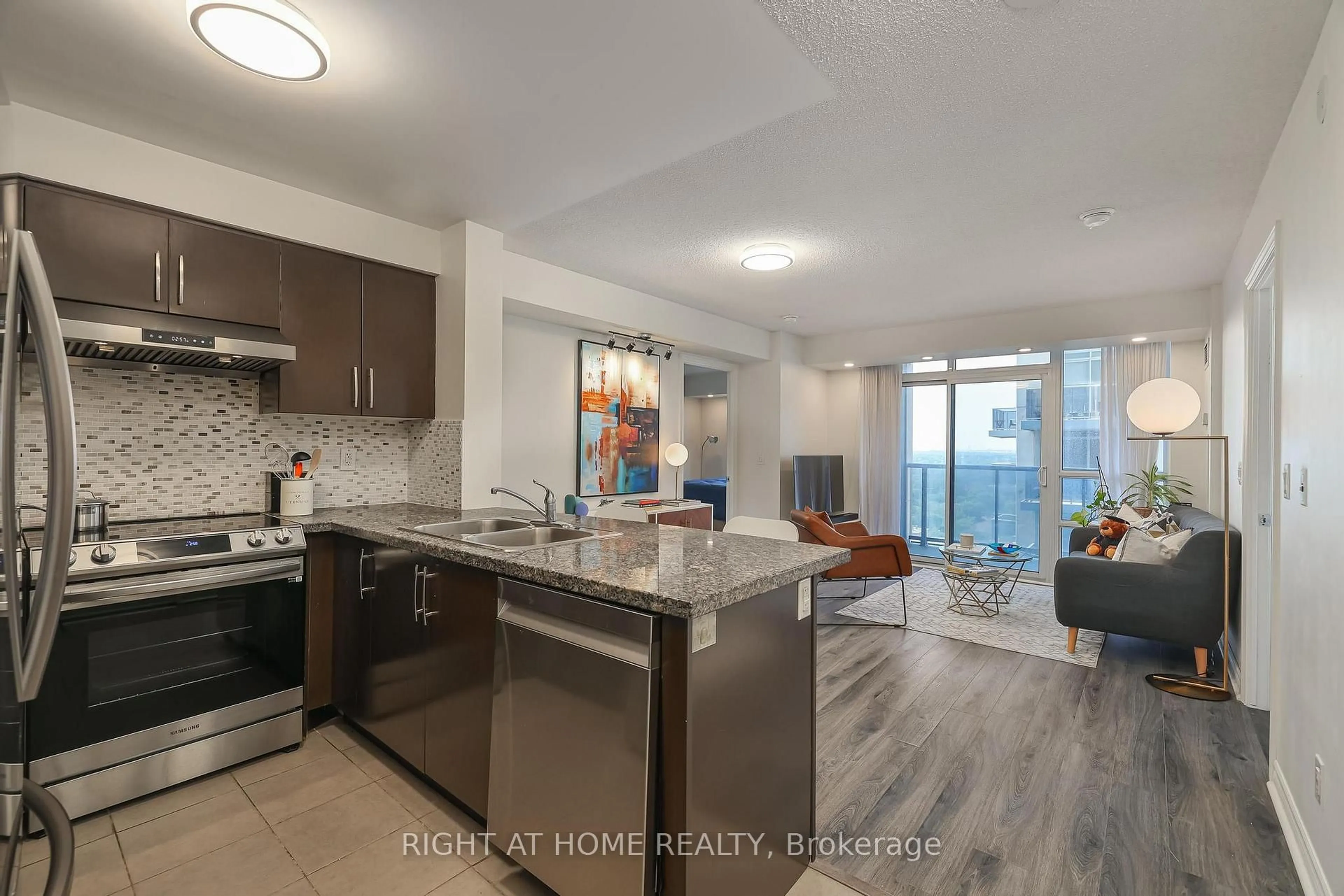 Open concept kitchen, unknown for 3 Michael Power Pl #2402, Toronto Ontario M9A 0A2