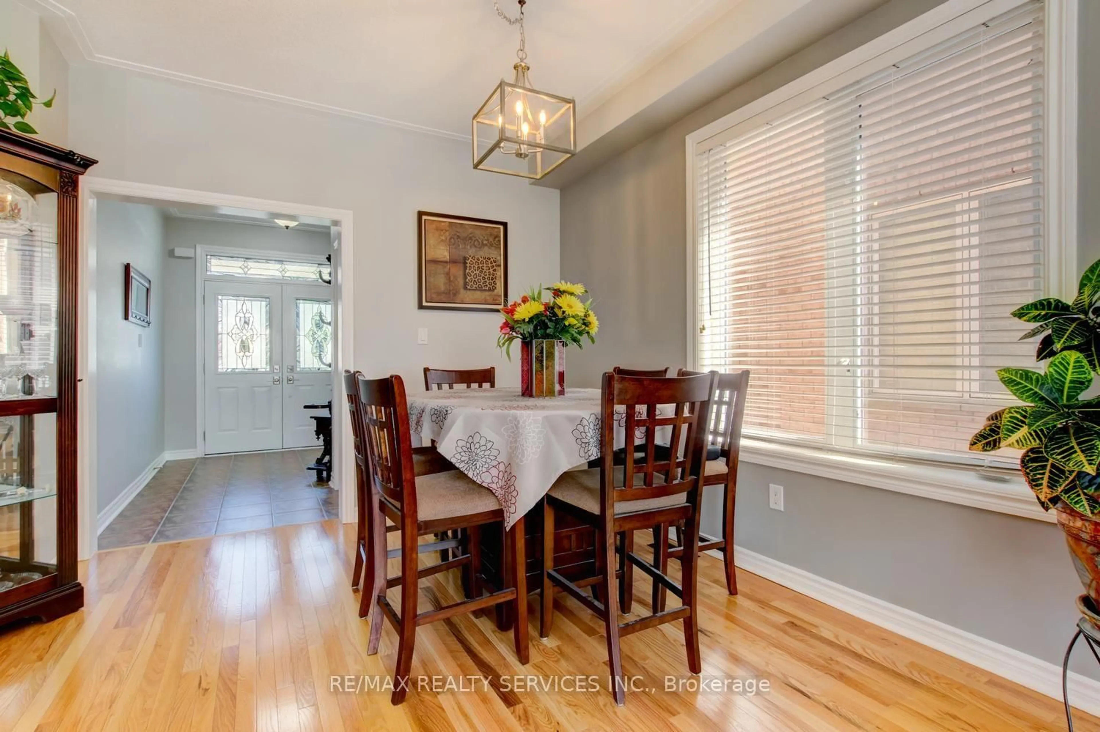 Dining room, wood/laminate floor for 35 Hardgate Cres, Brampton Ontario L7A 3V7