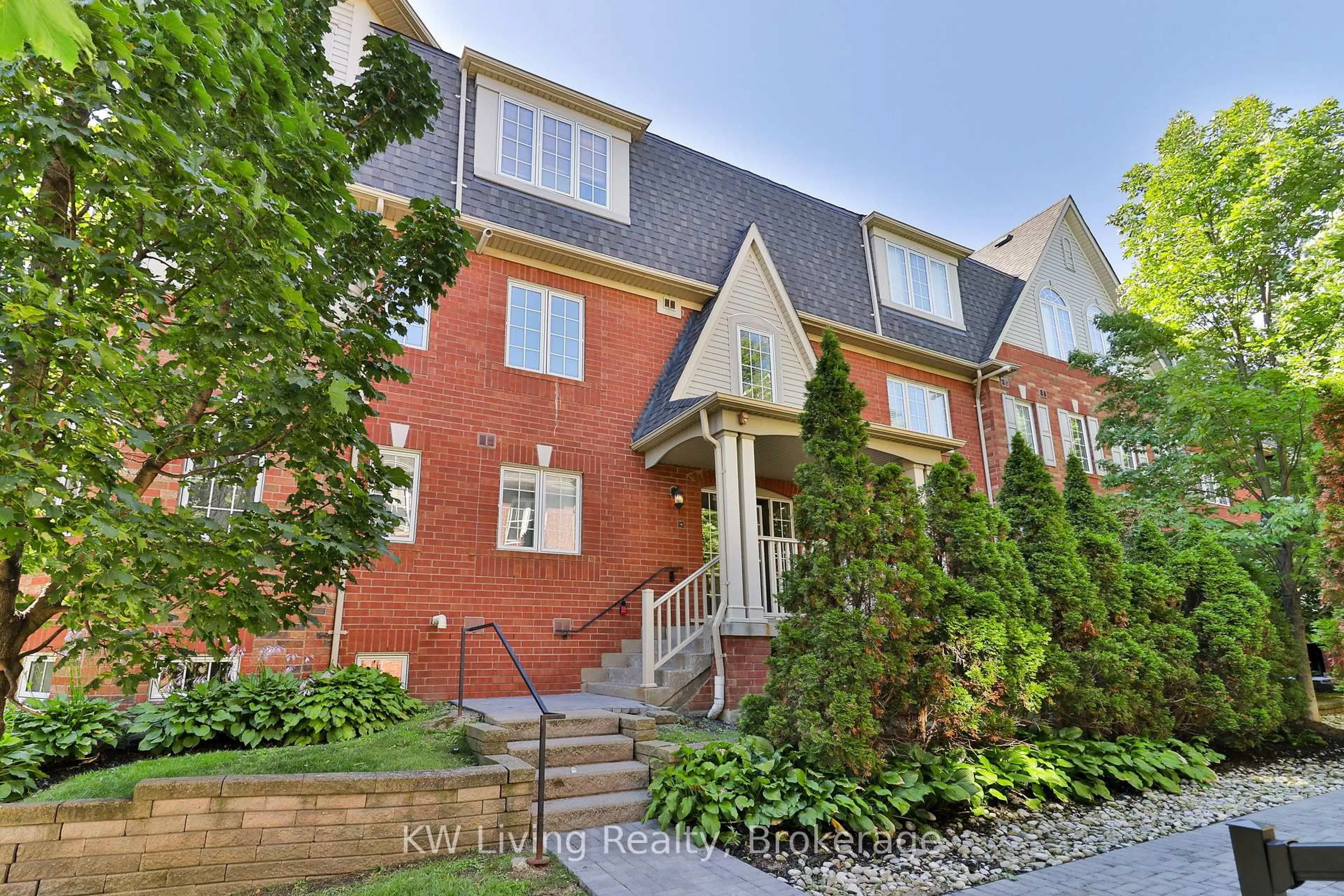 Home with brick exterior material, street for 740 Neighbourhood Circ #4, Mississauga Ontario L5B 0B4