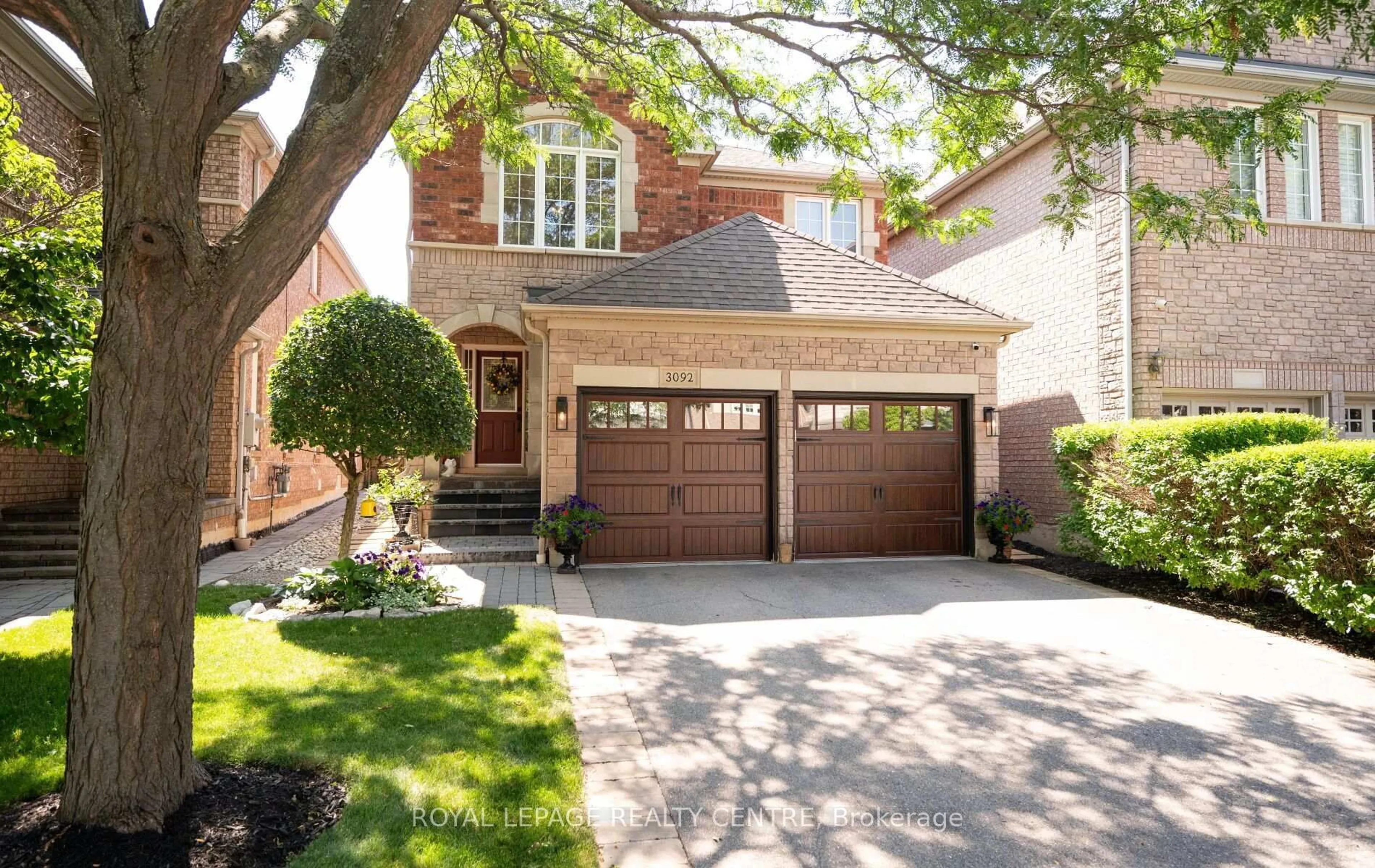 Home with brick exterior material, street for 3092 Owls Foot Dr, Mississauga Ontario L5M 6T8