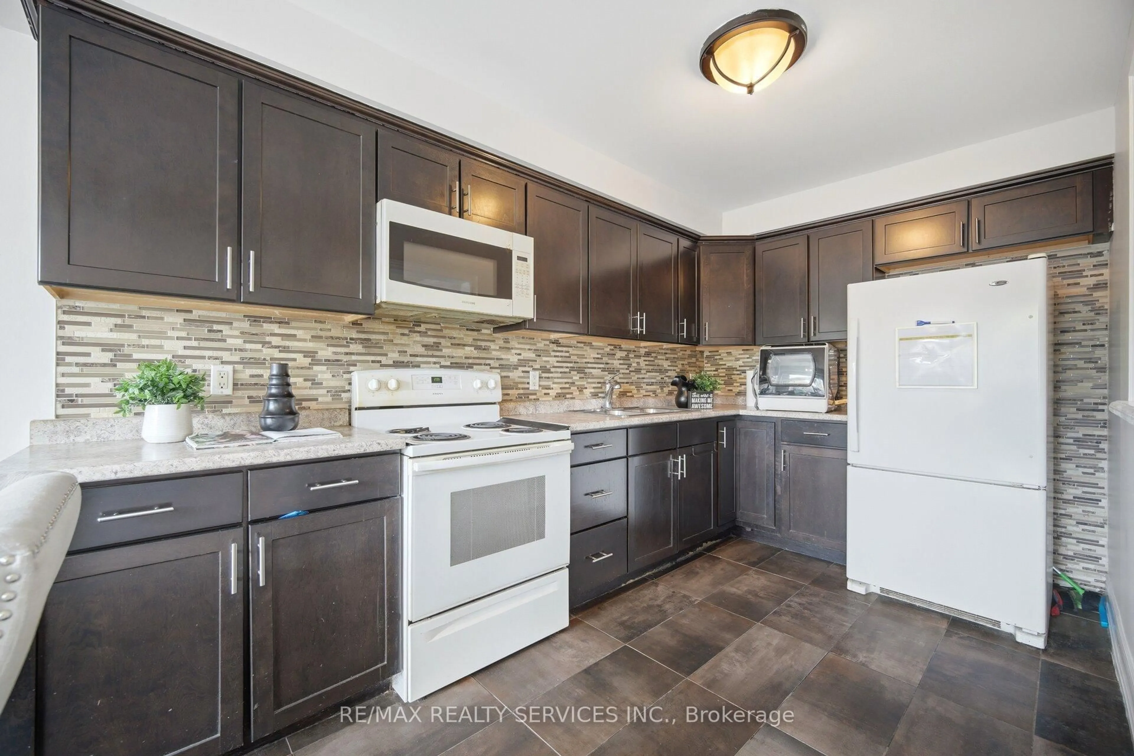 Standard kitchen, ceramic/tile floor for 43 Vodden Crt #47, Brampton Ontario L6V 2V7