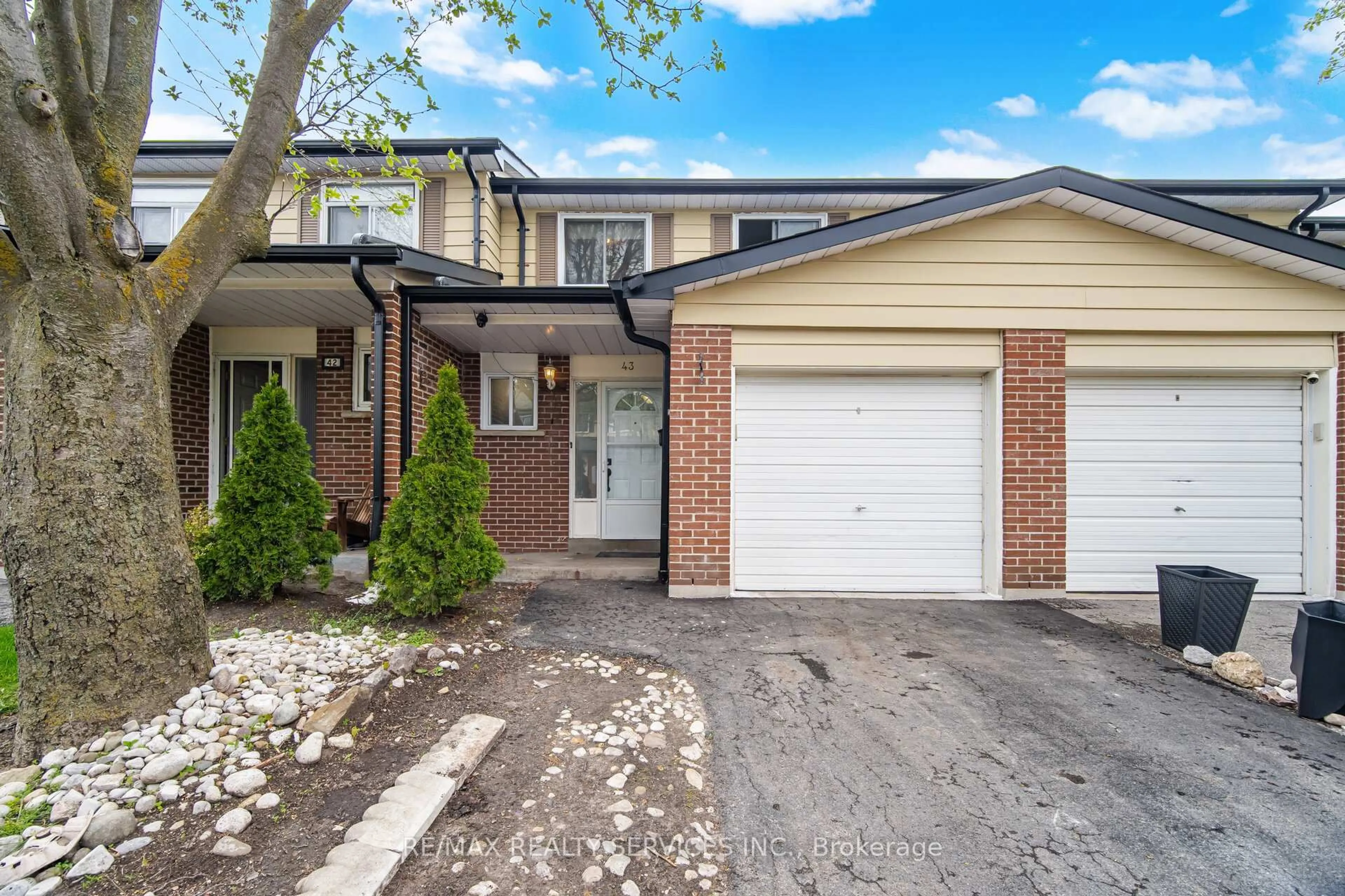 Home with brick exterior material, street for 43 Vodden Crt #47, Brampton Ontario L6V 2V7