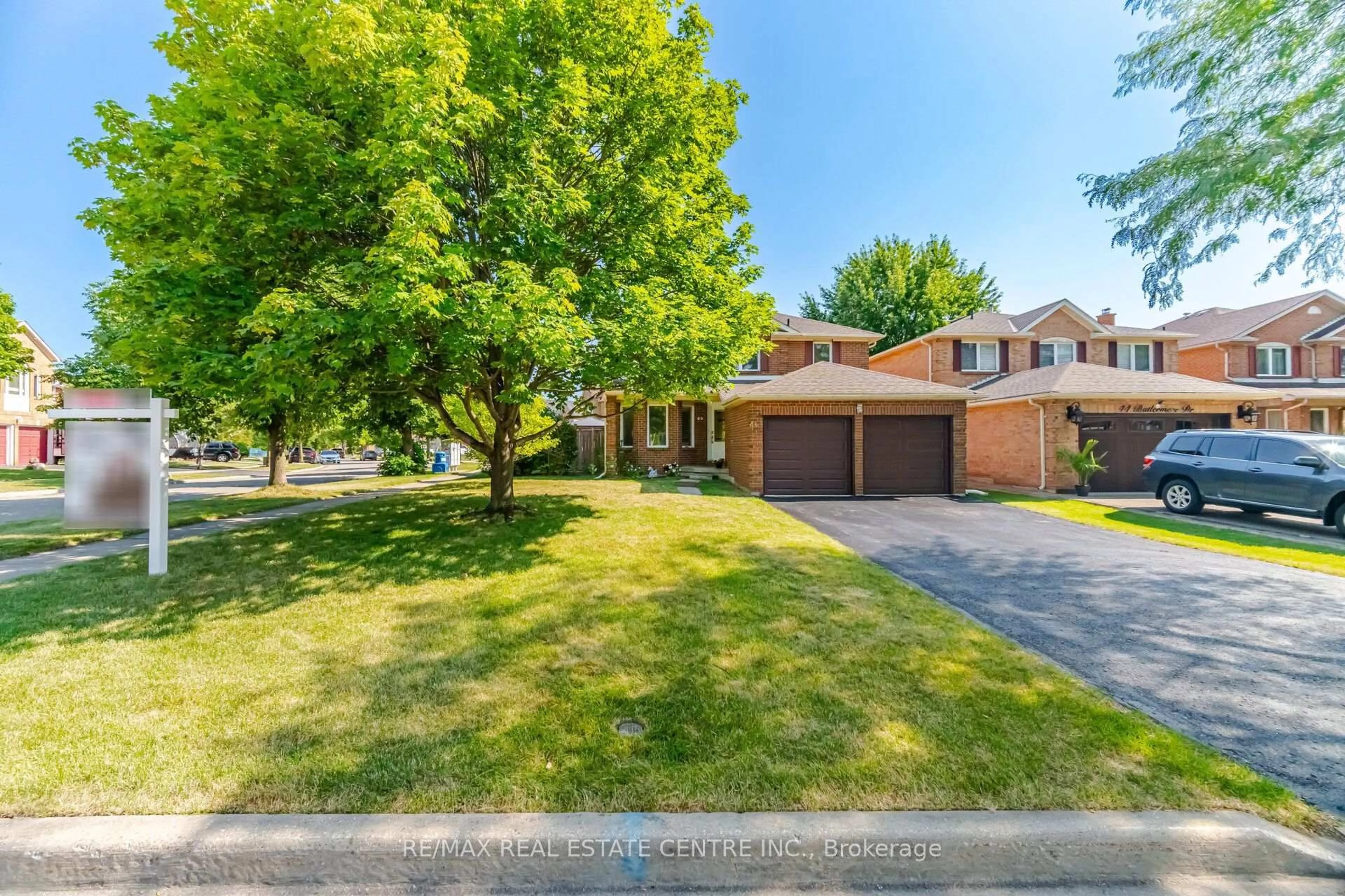 A pic from outside/outdoor area/front of a property/back of a property/a pic from drone, street for 46 Butlermere Dr, Brampton Ontario L6Y 4R9