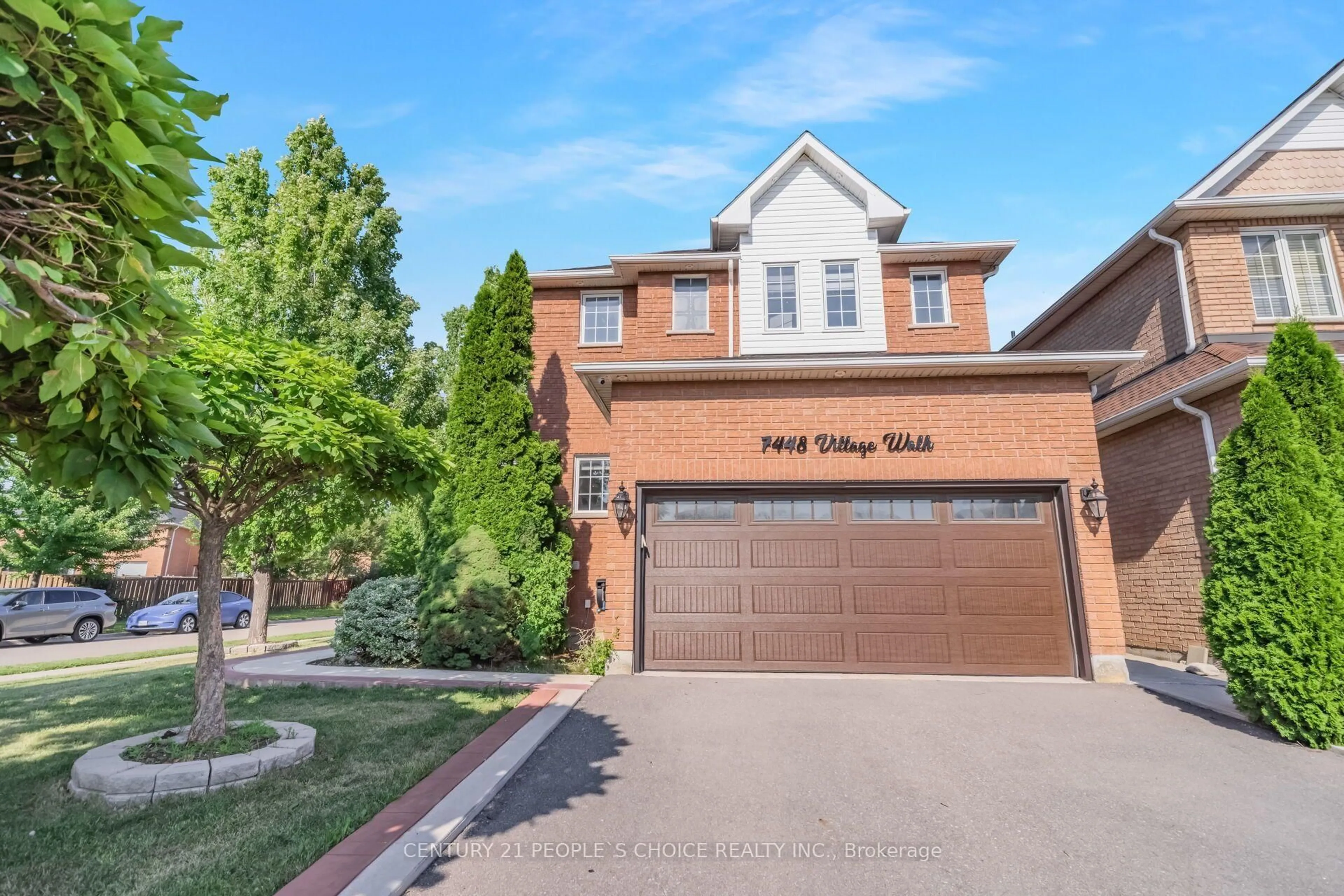 Home with brick exterior material, street for 7448 Village Walk, Mississauga Ontario L5W 2V7