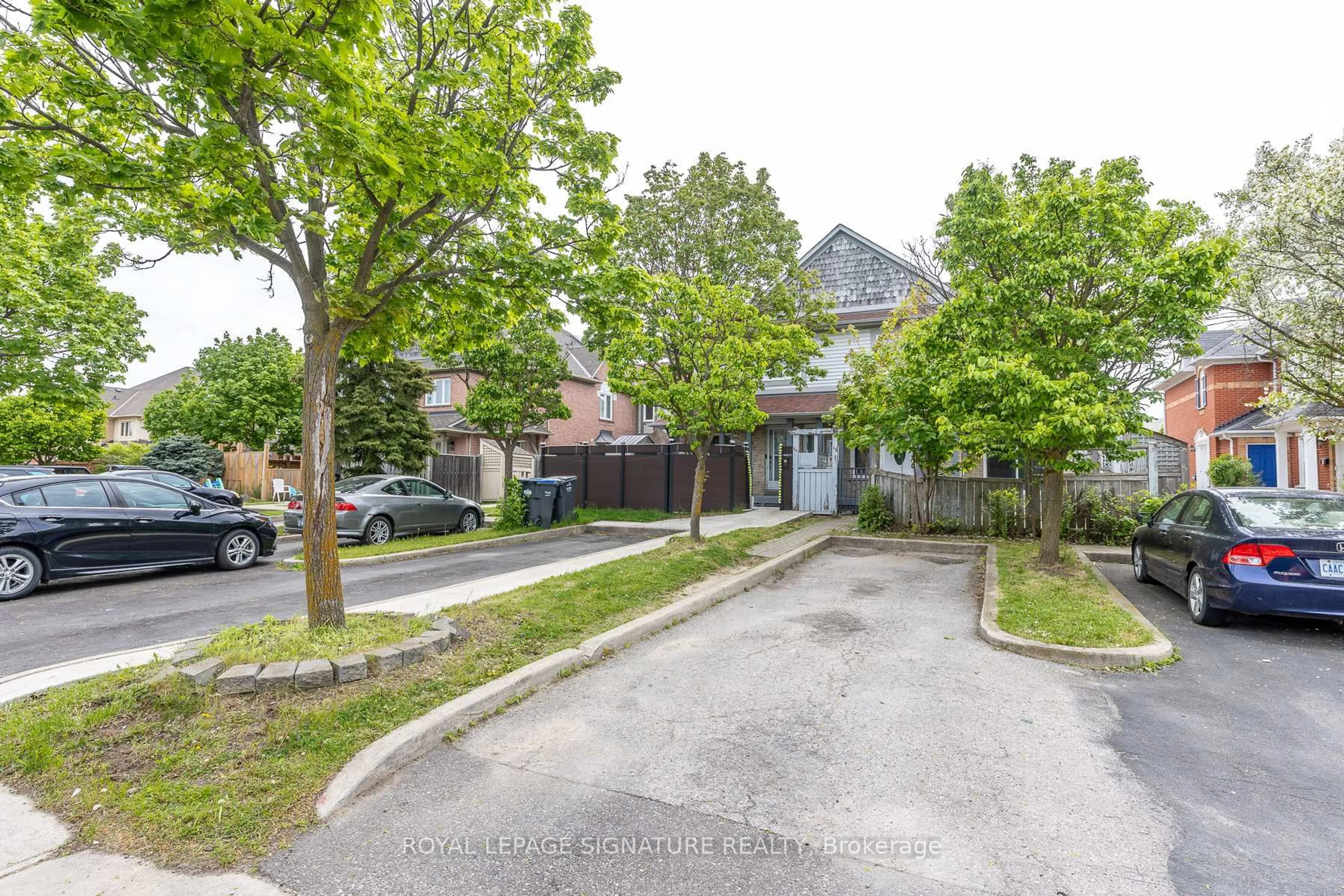 A pic from outside/outdoor area/front of a property/back of a property/a pic from drone, street for 60 Blue Spruce St, Brampton Ontario L6R 1C3