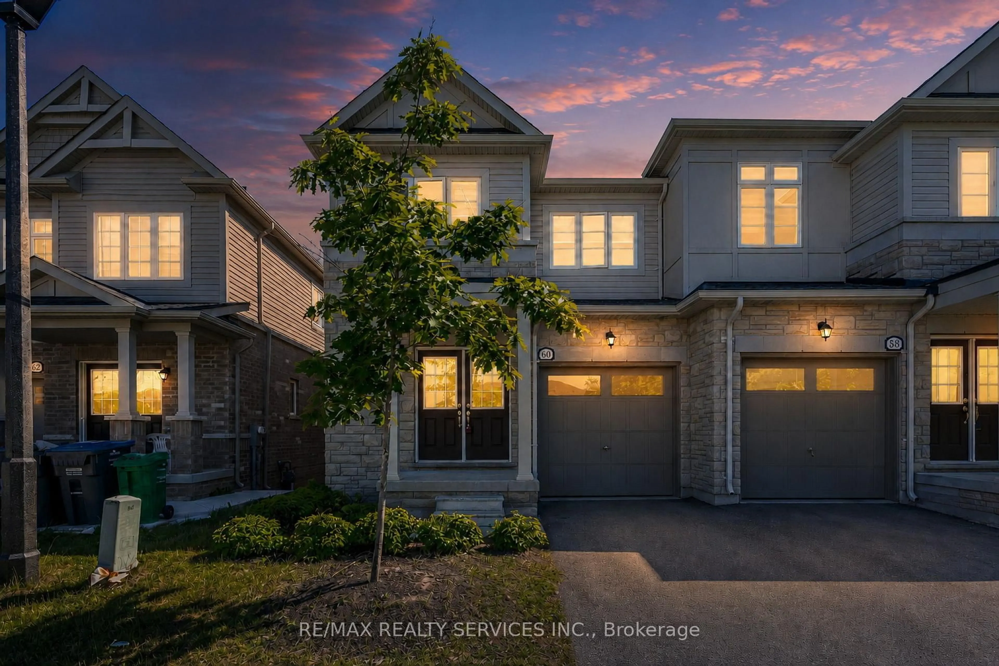 Home with brick exterior material, street for 60 Brixham Lane, Brampton Ontario L7A 5K2