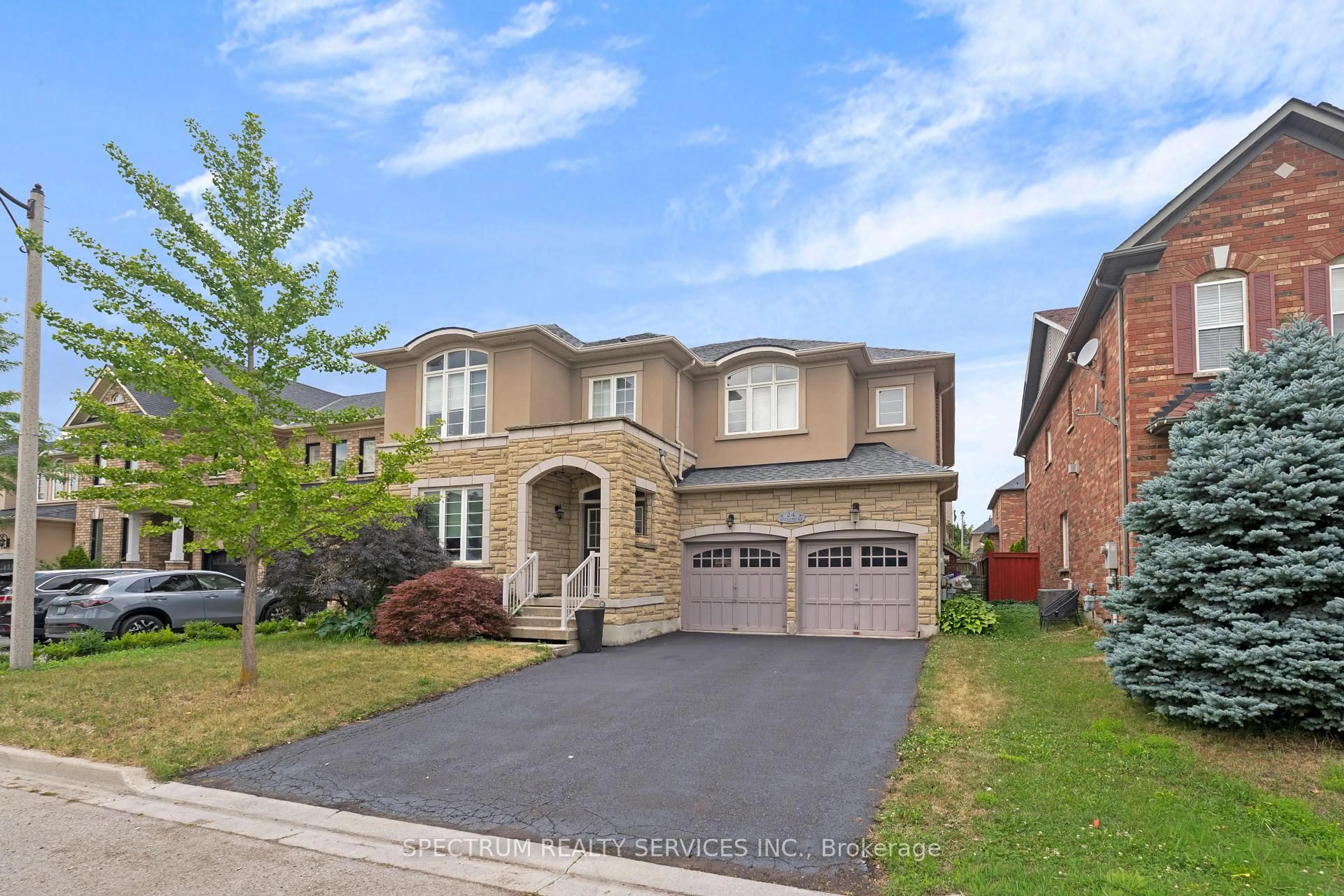 Home with brick exterior material, street for 24 Aristocrat Rd, Brampton Ontario L6P 1X7