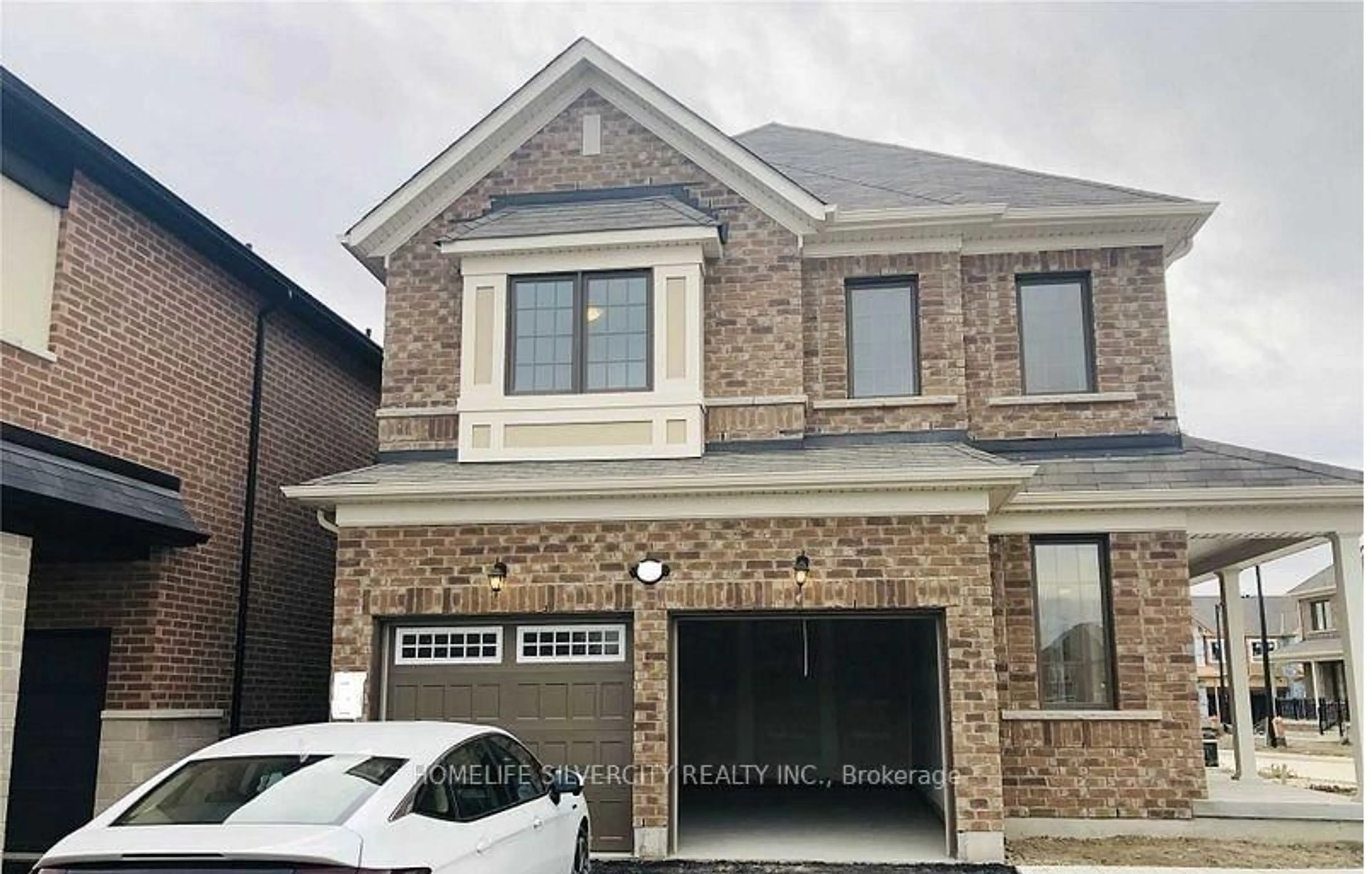 Home with brick exterior material, street for 39 Boothill Dr, Brampton Ontario L7A 5E4
