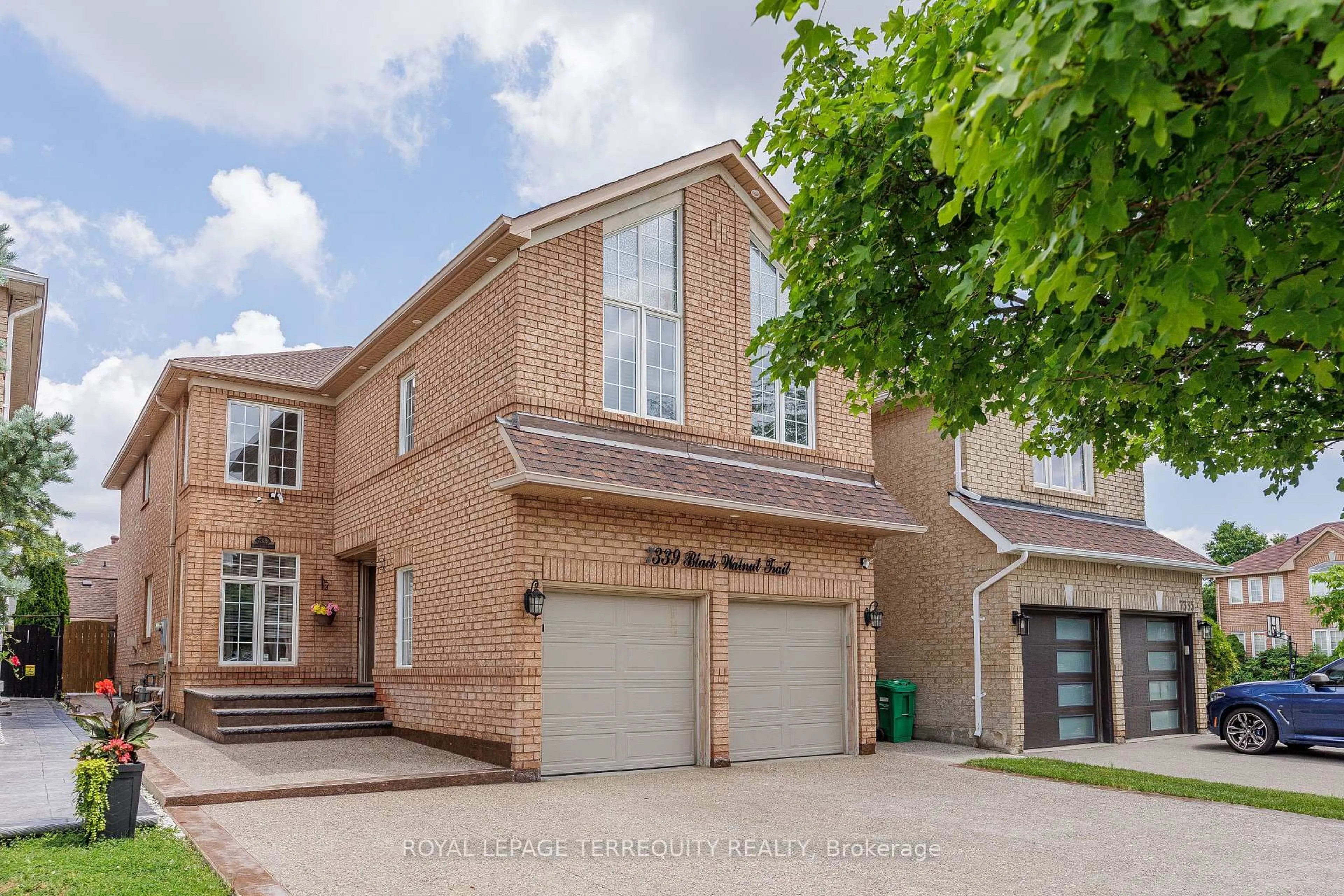 Home with brick exterior material, street for 7339 Black Walnut Tr, Mississauga Ontario L5N 7M3