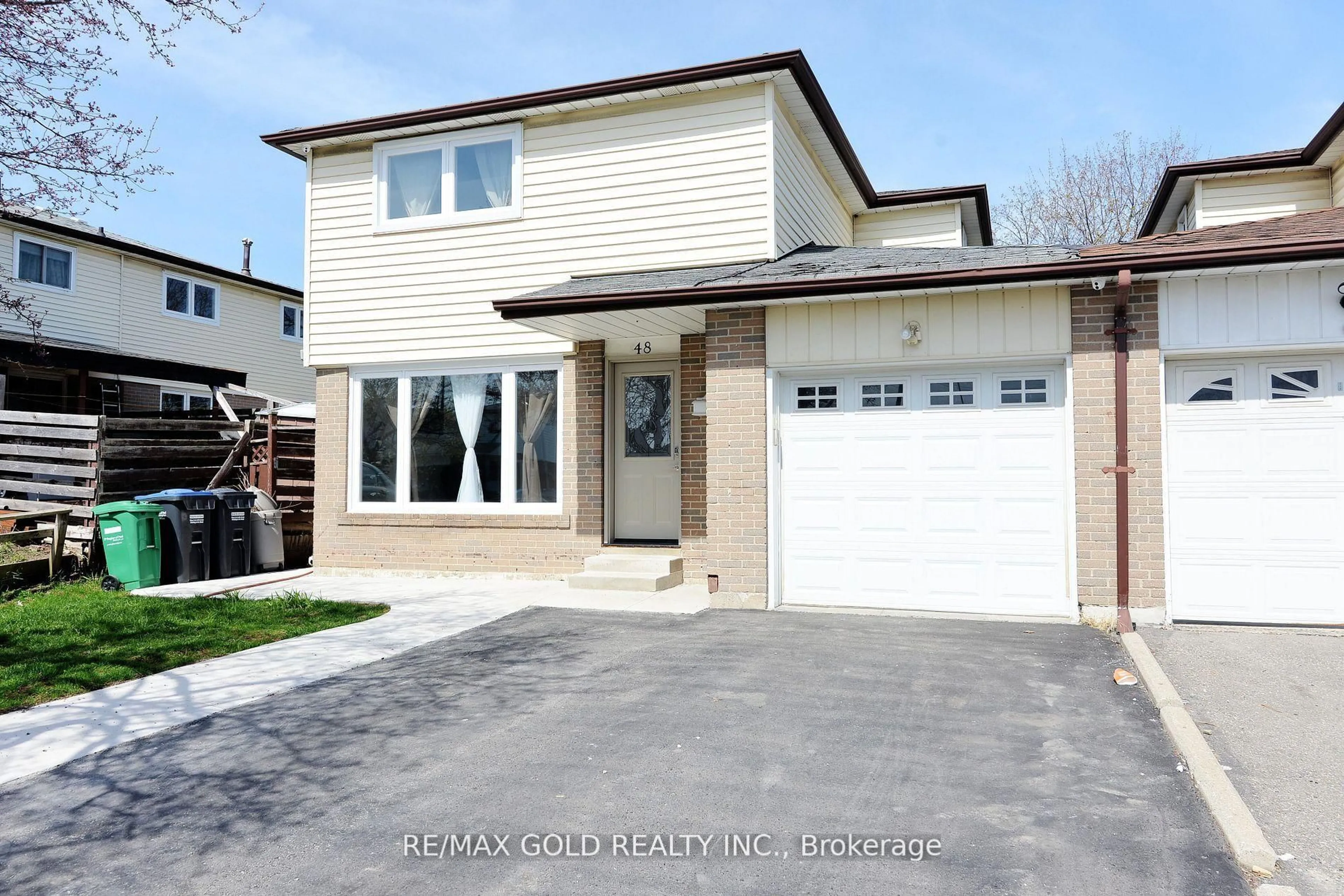 Home with vinyl exterior material, street for 48 Garside Cres, Brampton Ontario L6S 1H6