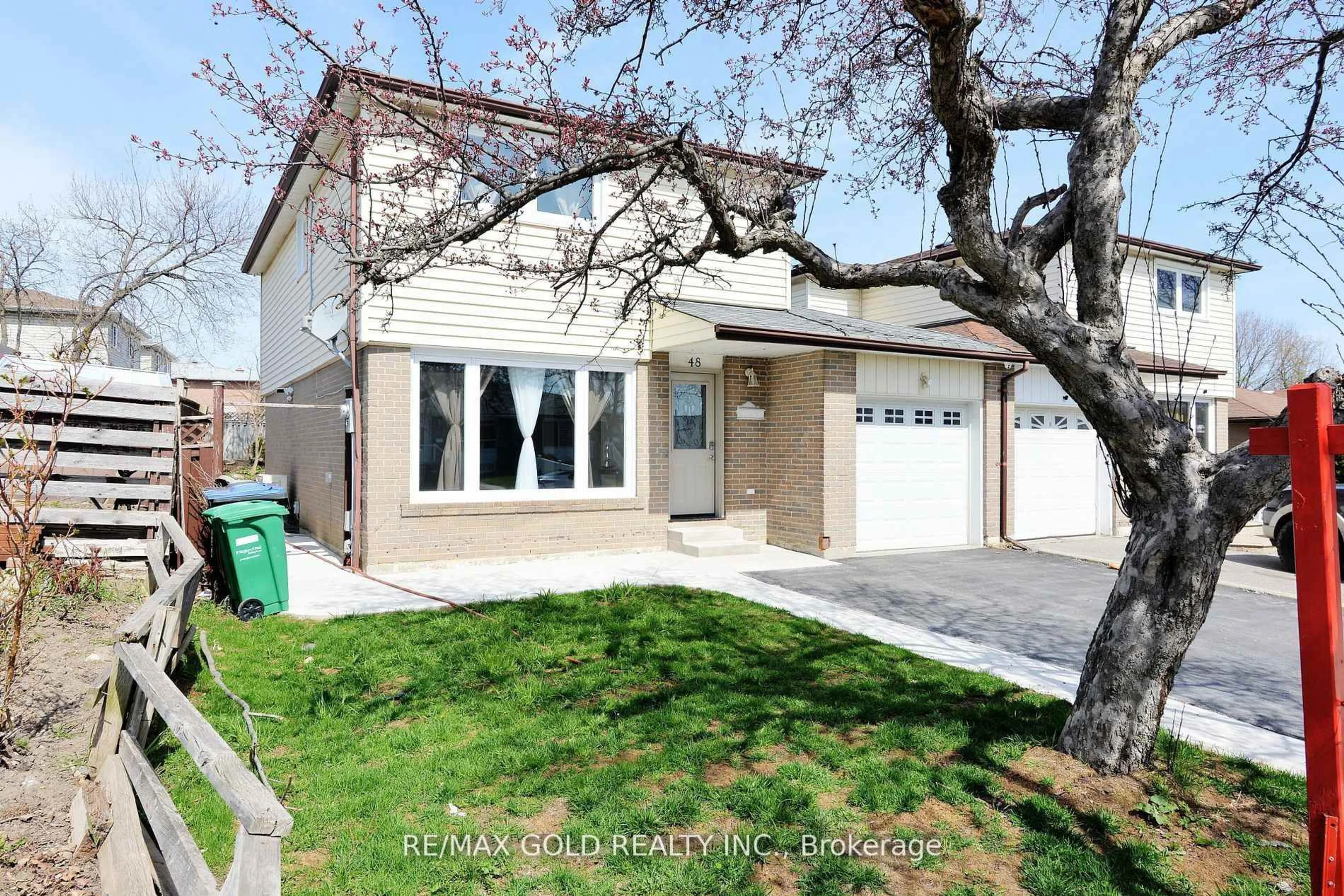 Home with vinyl exterior material, street for 48 Garside Cres, Brampton Ontario L6S 1H6