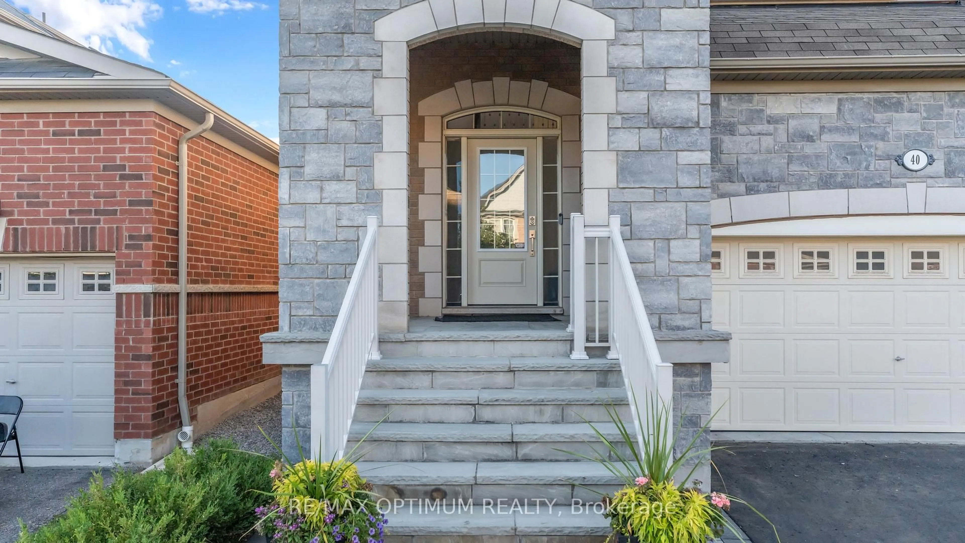 Home with brick exterior material, street for 40 Attraction Dr, Brampton Ontario L6Y 0C1