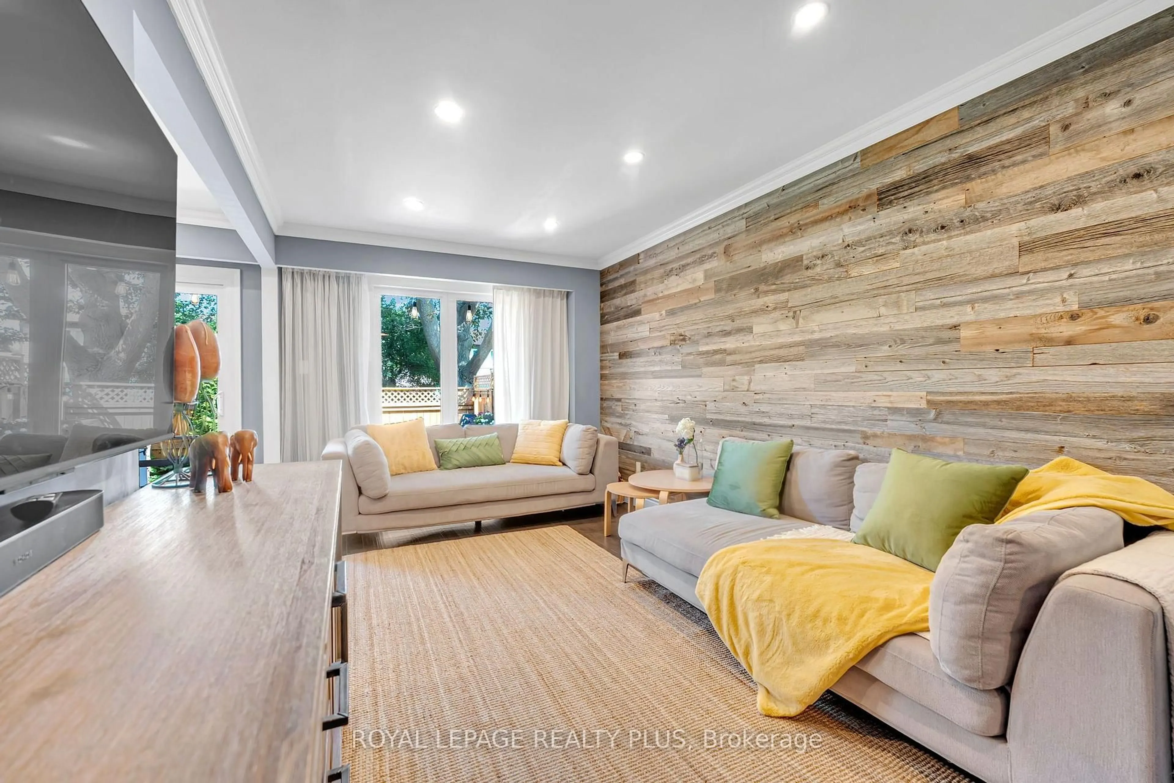 Living room with furniture, wood/laminate floor for 3395 Cliff Rd #28, Mississauga Ontario L5A 3M7