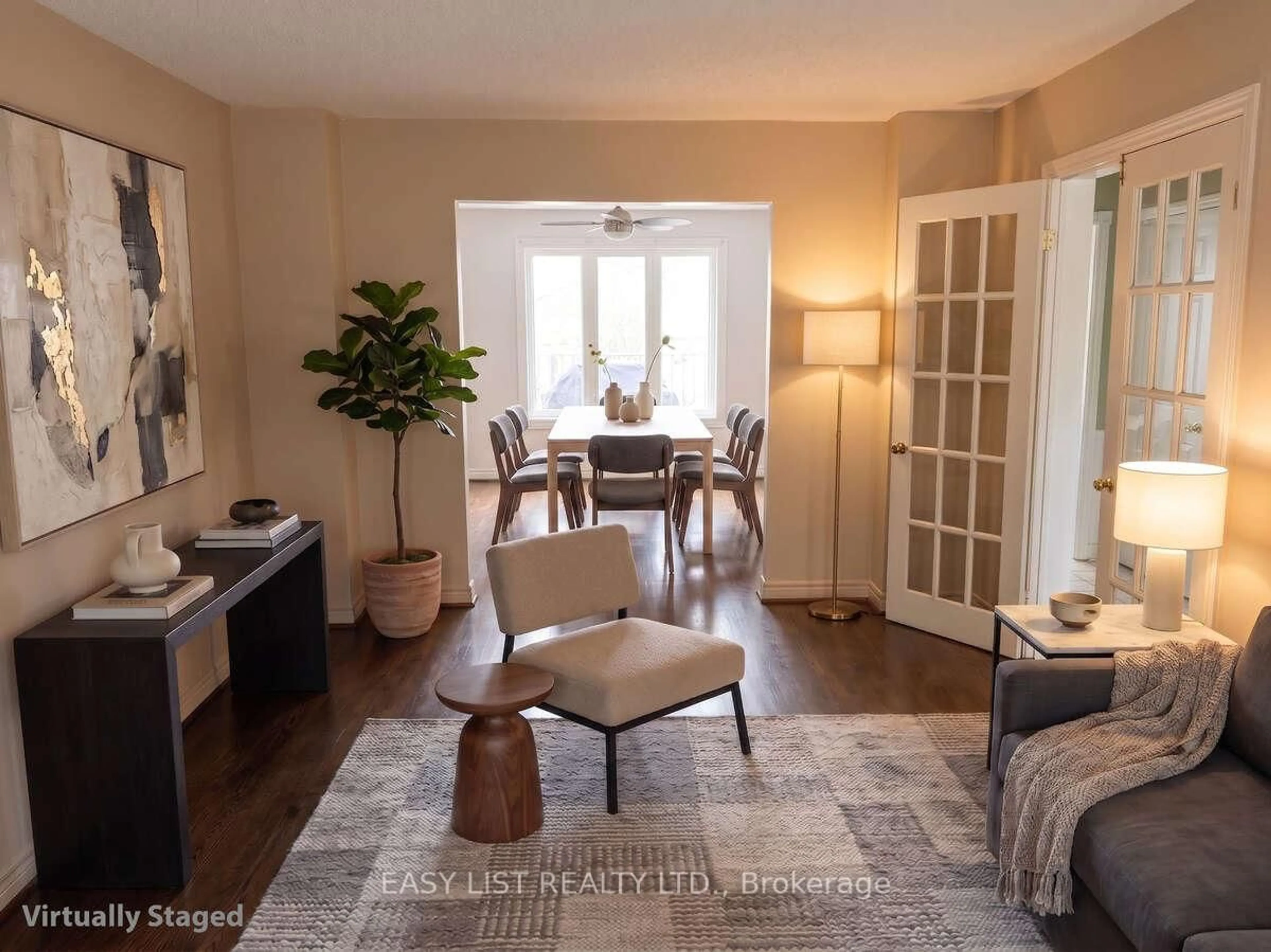 Living room with furniture, wood/laminate floor for 208 Anastasia Terr, Mississauga Ontario L5B 3A6